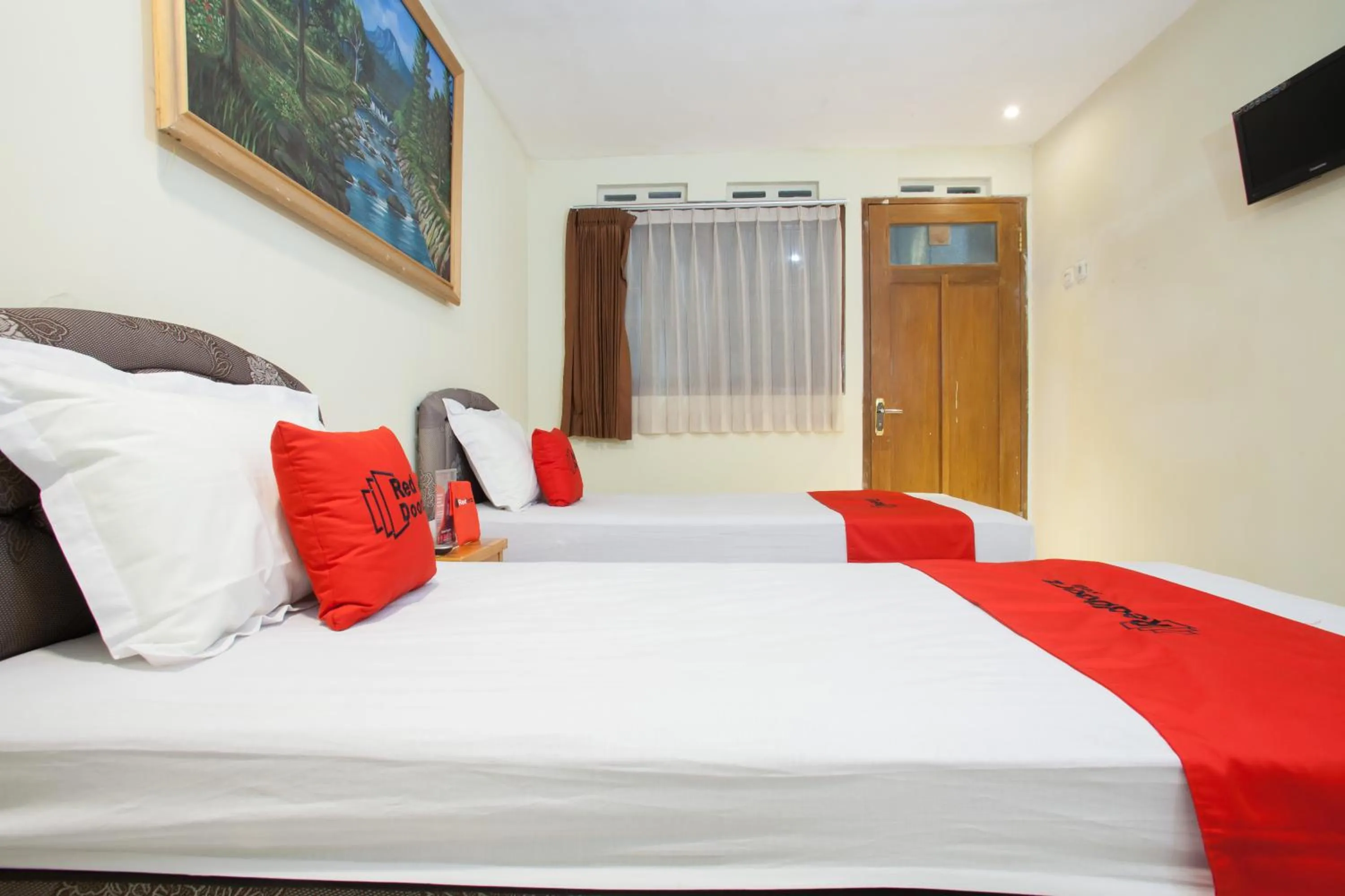 Bed in RedDoorz At Pandan Inn Batu