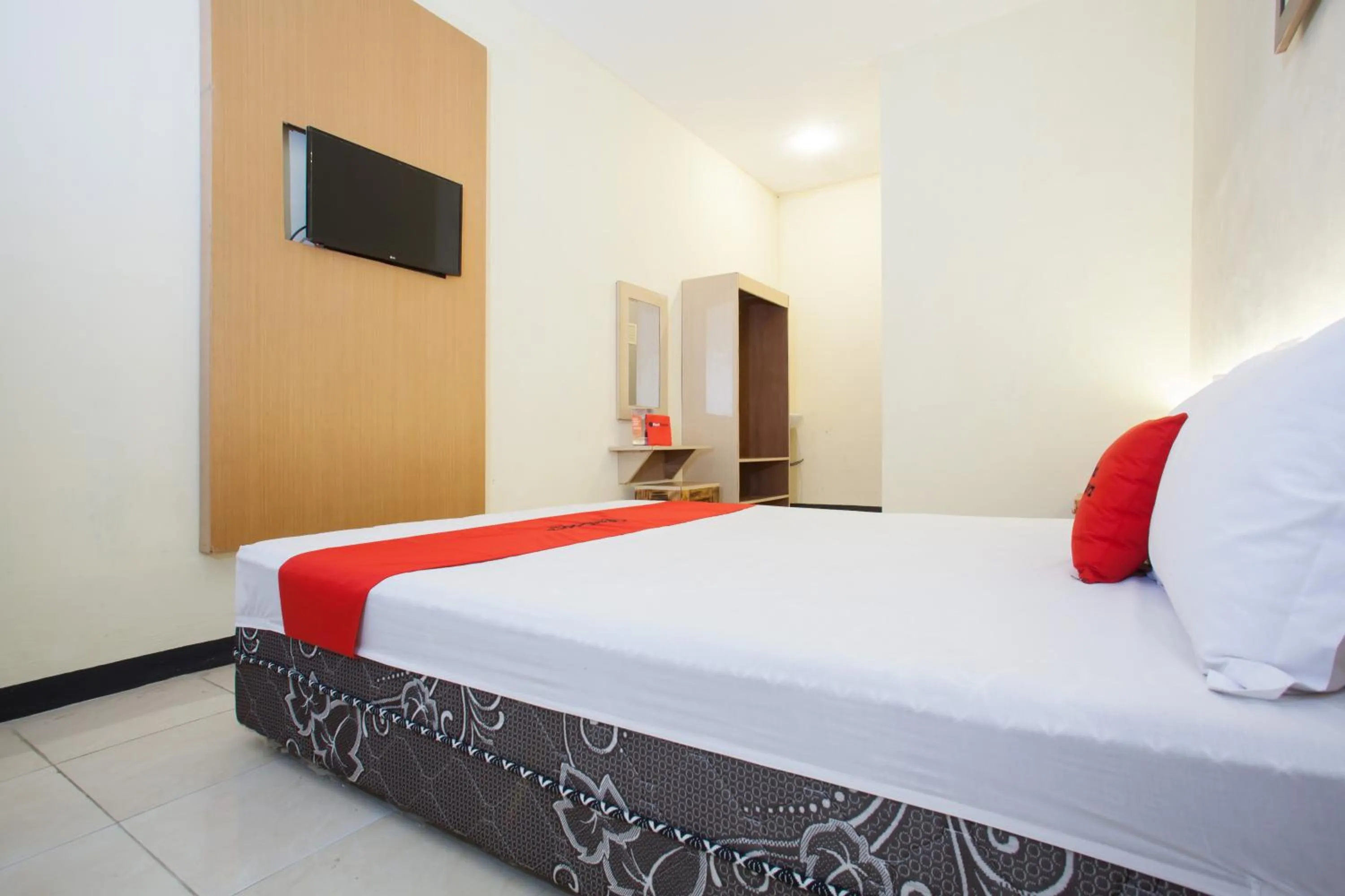 Bed in RedDoorz At Pandan Inn Batu