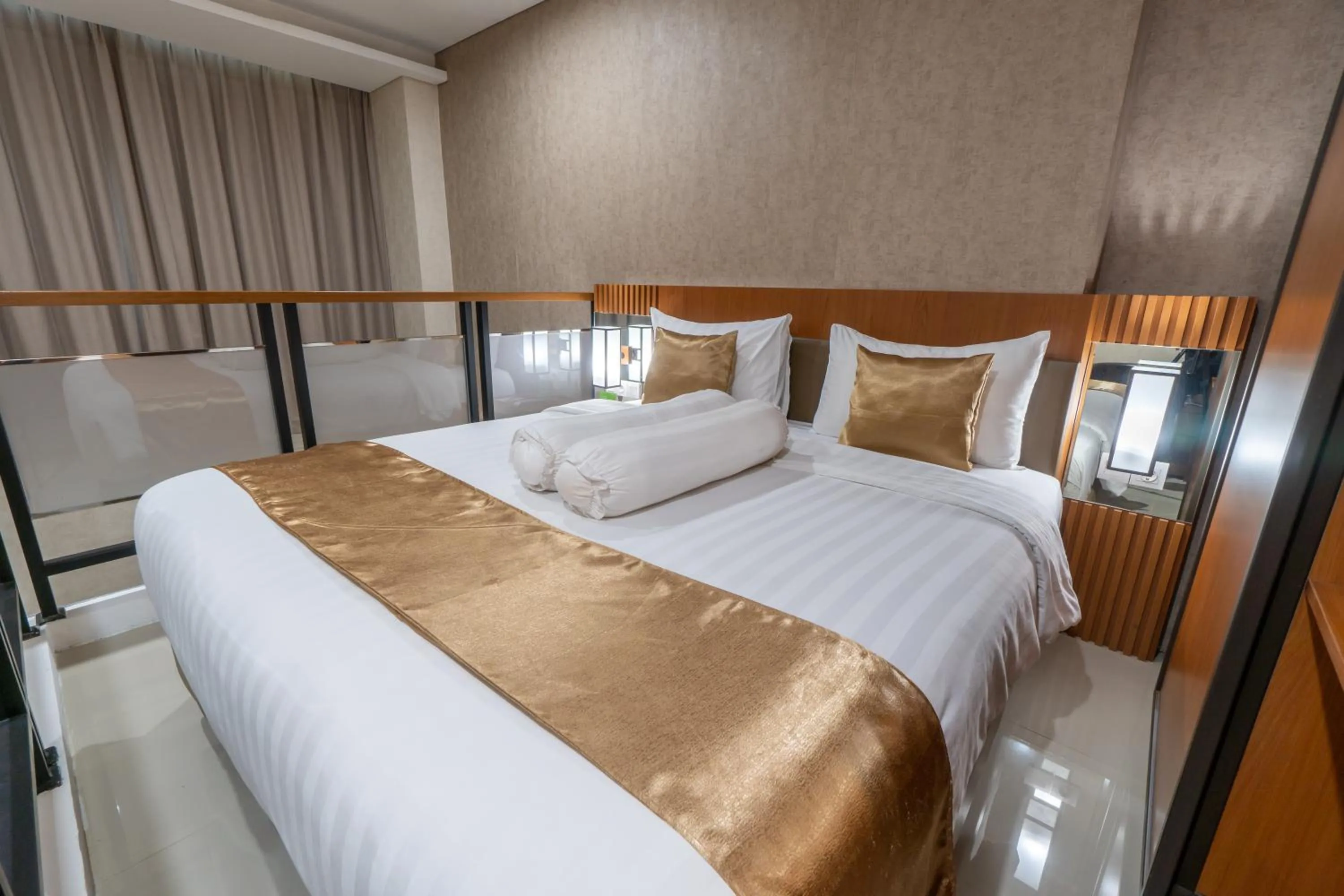 Bed in Braling Grand Hotel Purbalingga, Azana Hotels Collection