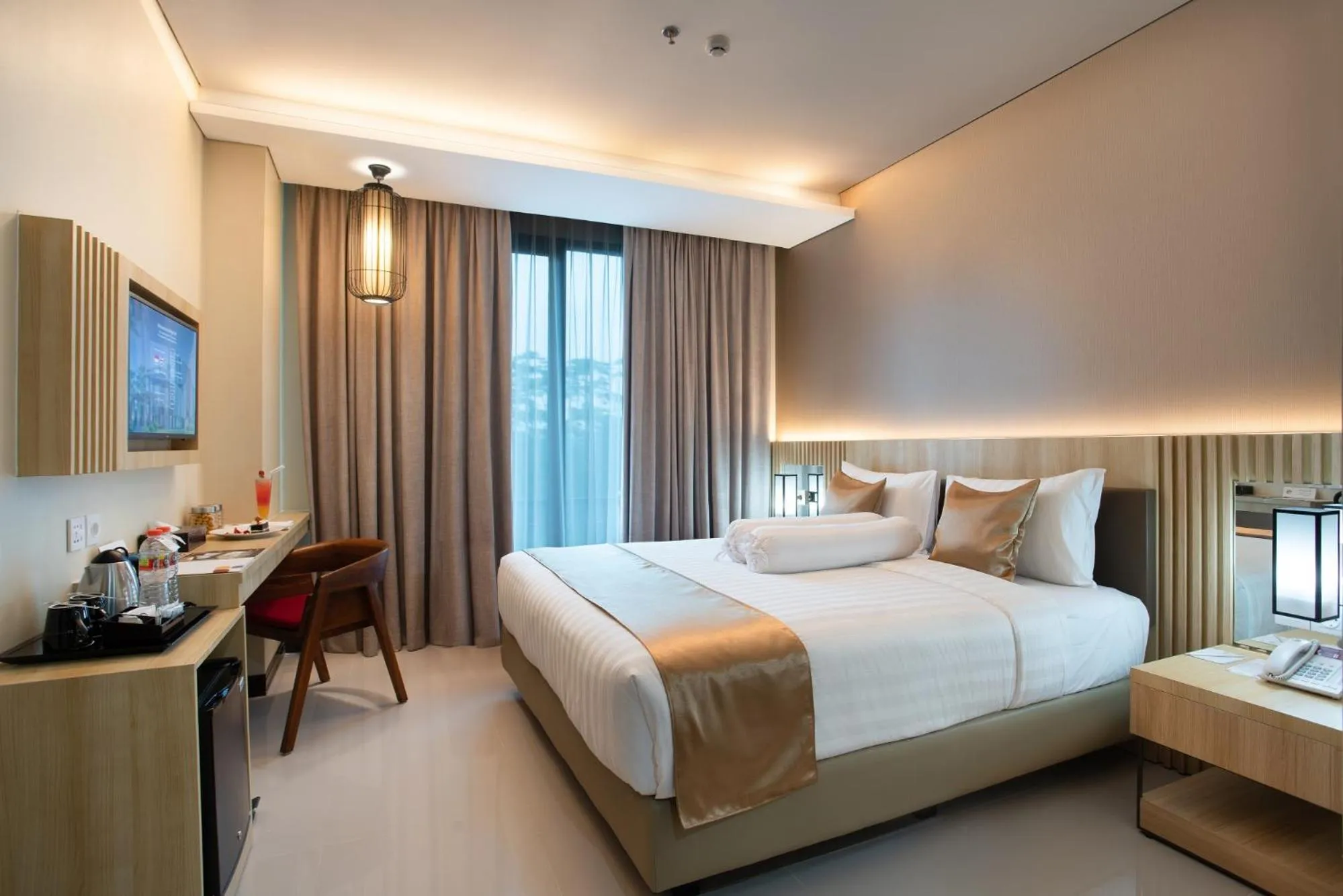 Bed in Braling Grand Hotel Purbalingga, Azana Hotels Collection