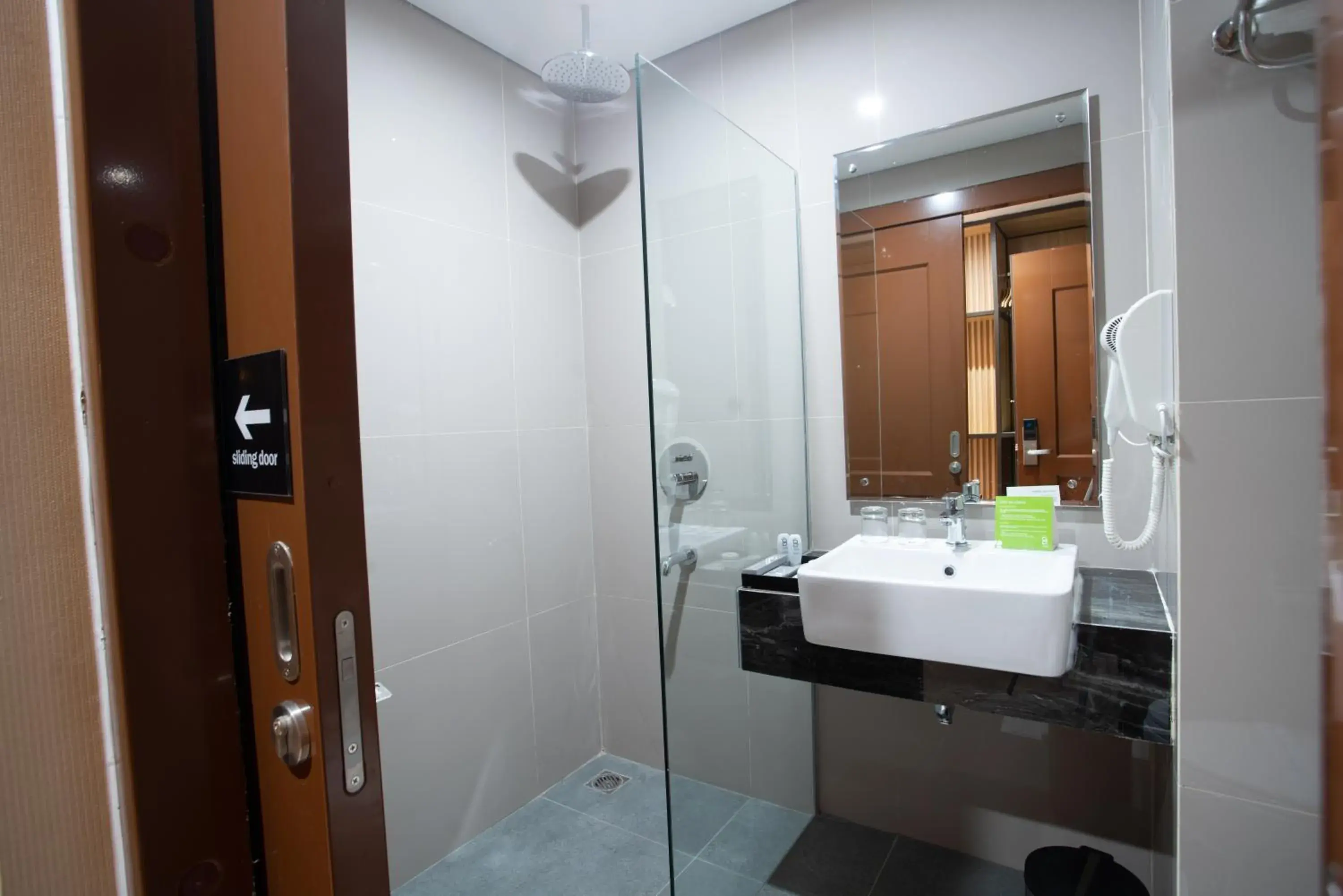 Bathroom in Braling Grand Hotel Purbalingga, Azana Hotels Collection Bathroom in Braling Grand Hotel Purbalingga, Azana Hotels Collection