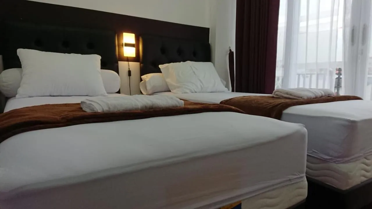 Bed in EDUTAMA Homestay Syariah