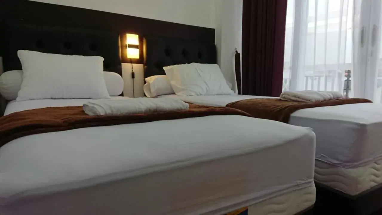 Bed in EDUTAMA Homestay Syariah Bed in EDUTAMA Homestay Syariah