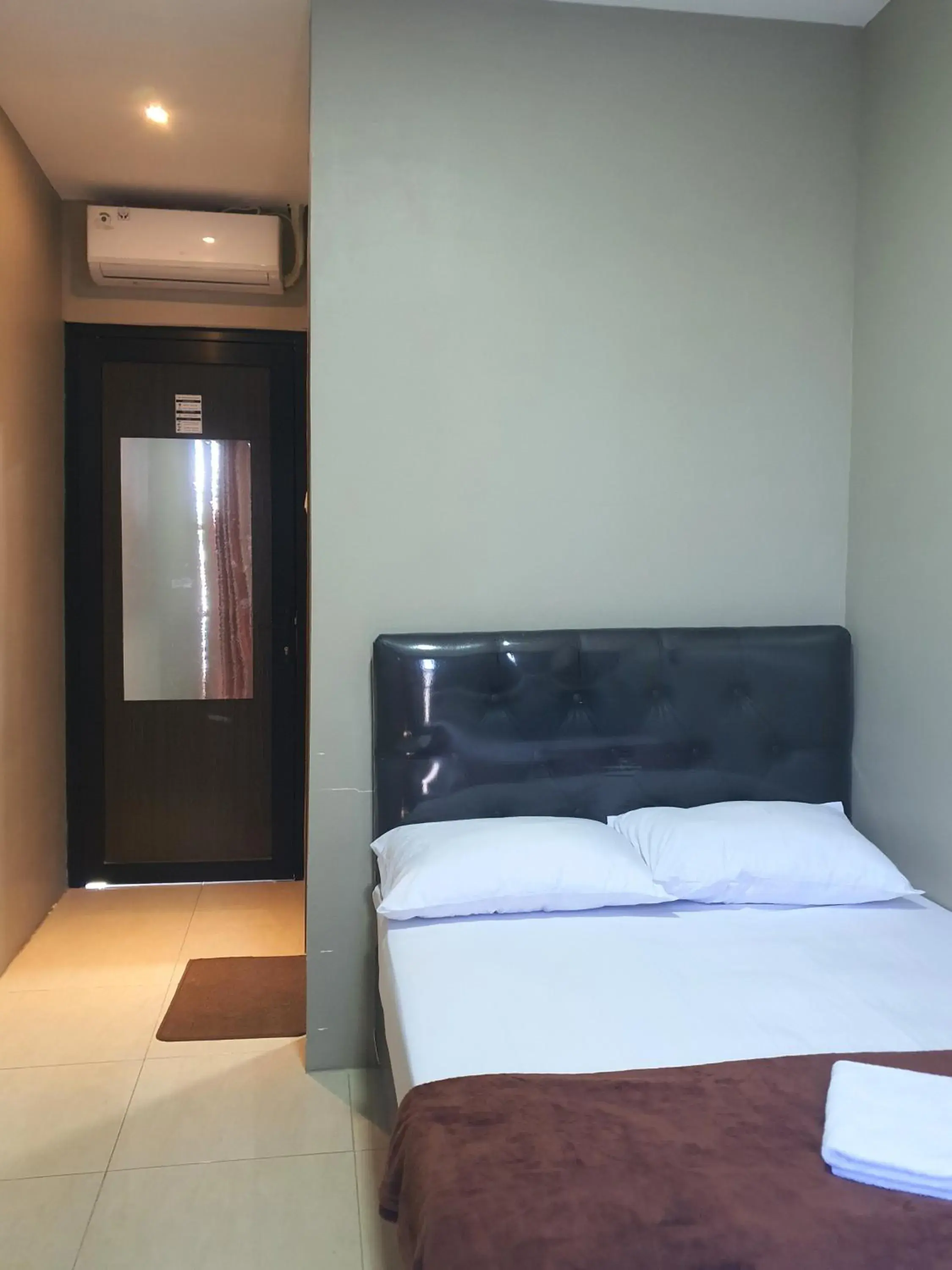 Bed in EDUTAMA Homestay Syariah Bed in EDUTAMA Homestay Syariah