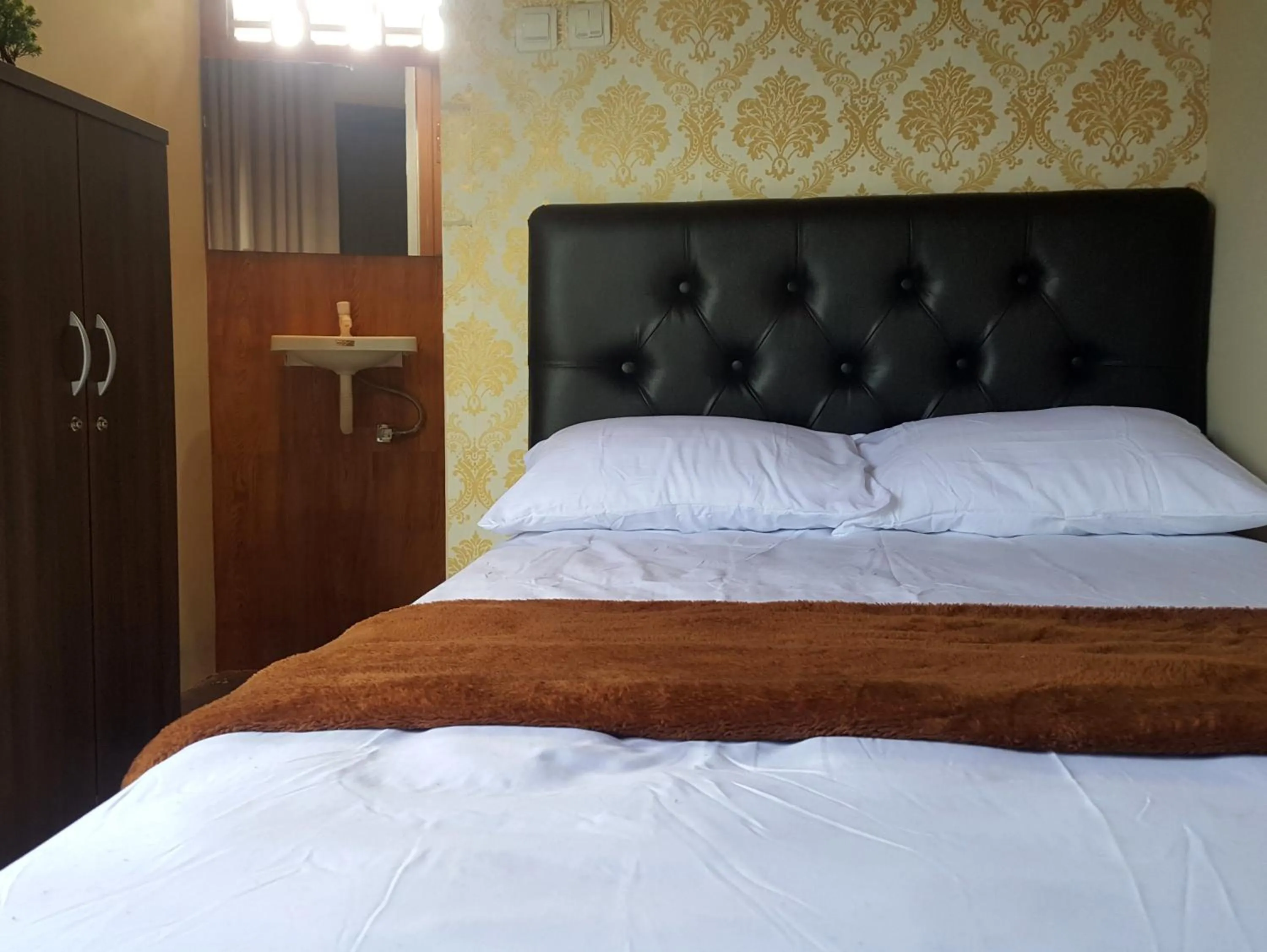 Bed in EDUTAMA Homestay Syariah