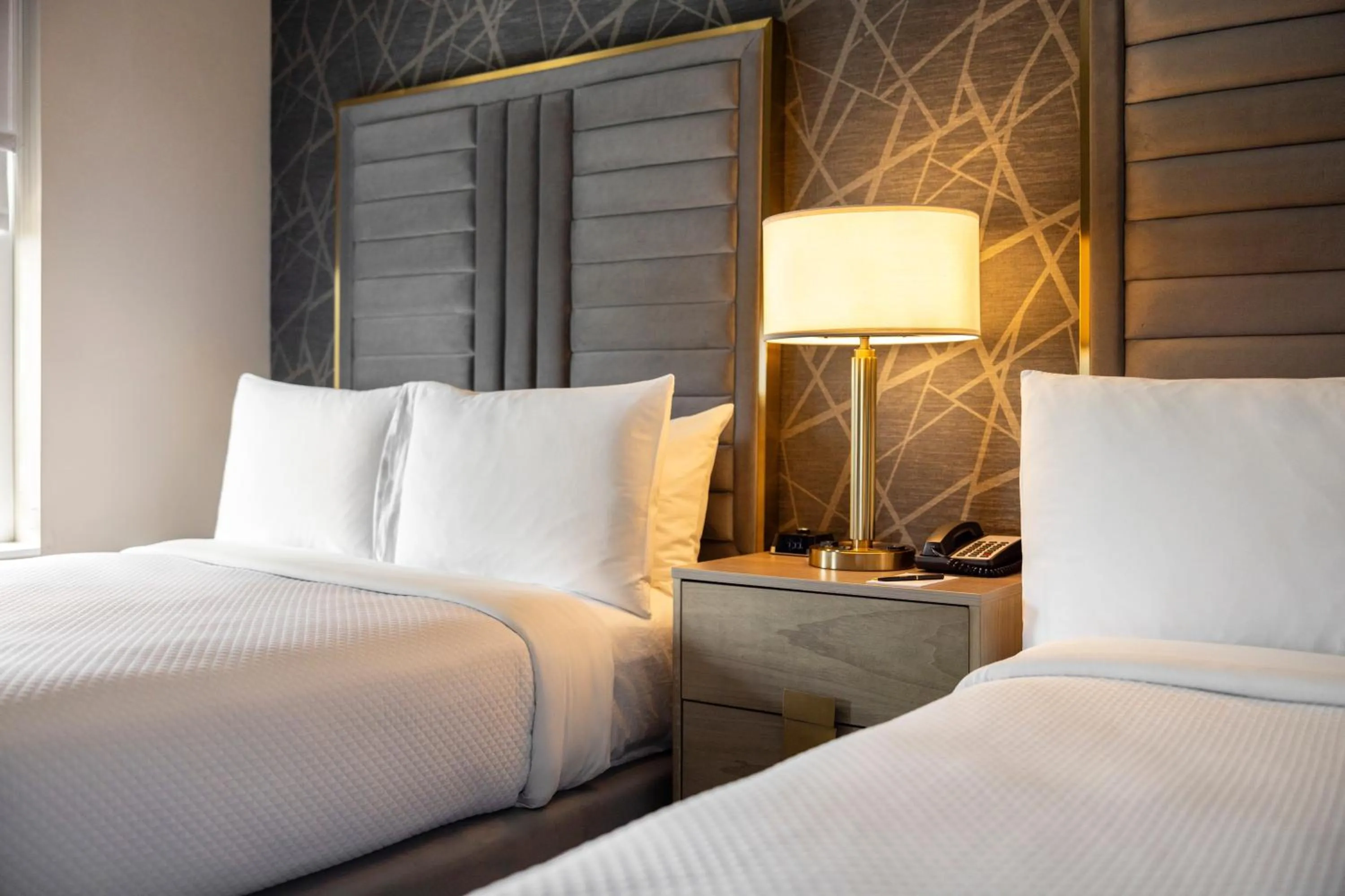 Bed in The Chateau Grande Hotel