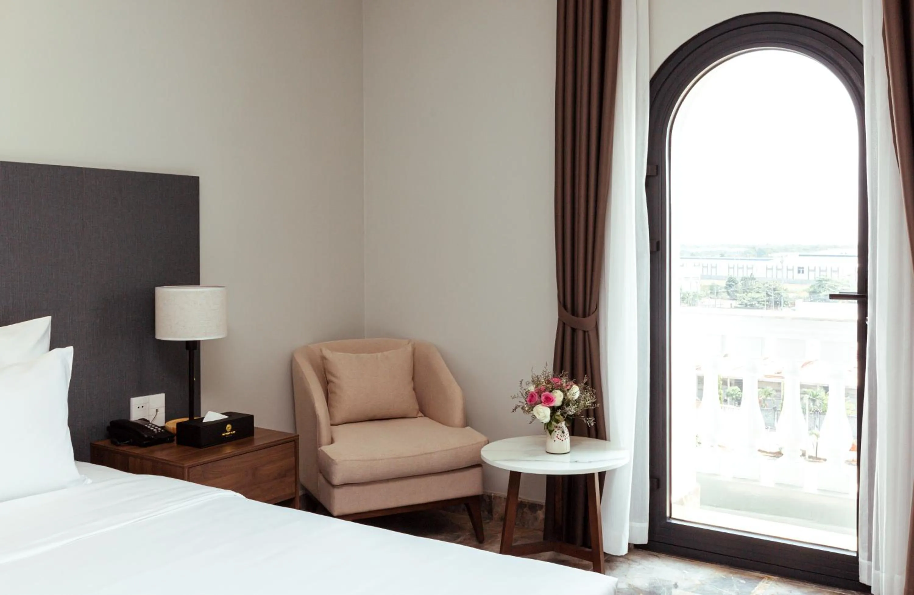 Seating area, Bed in PHU THANG GRAND HOTEL