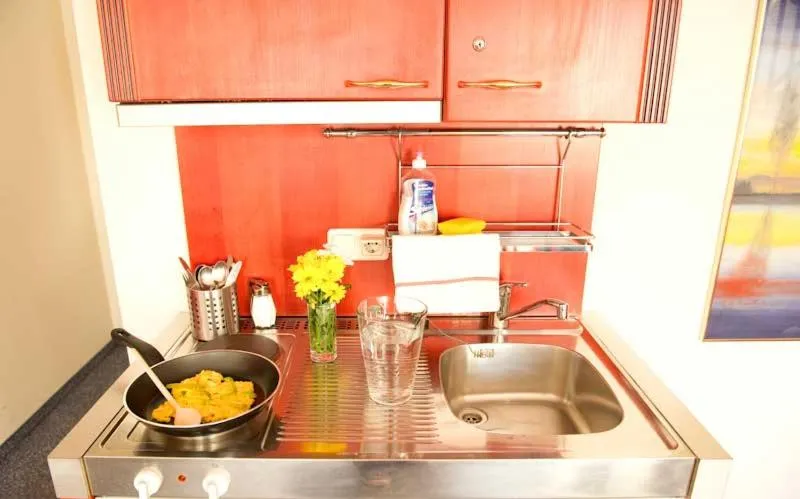 Kitchen or kitchenette in Hotel Allegro Wien