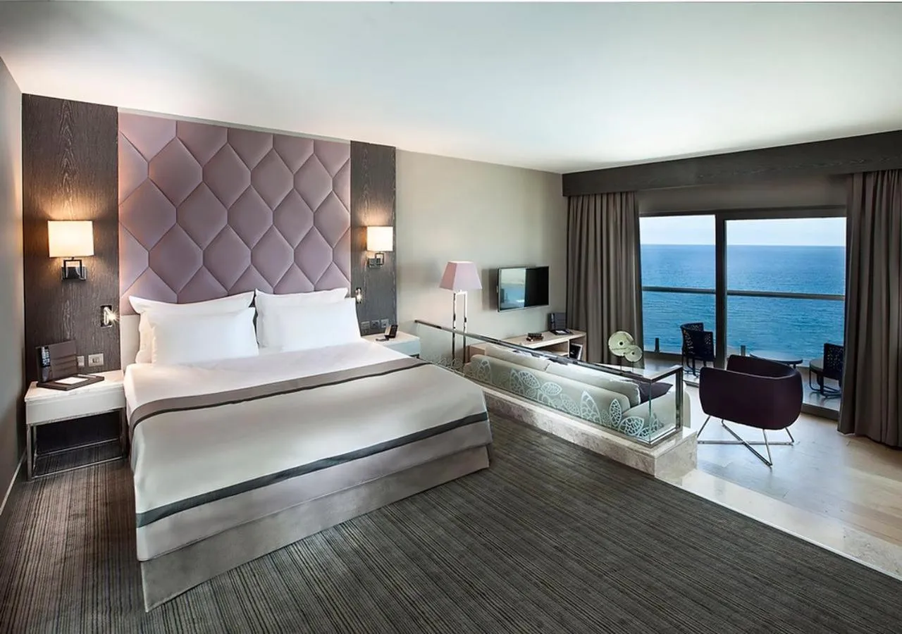 Bed in Elexus Hotel Resort & Spa & Casino