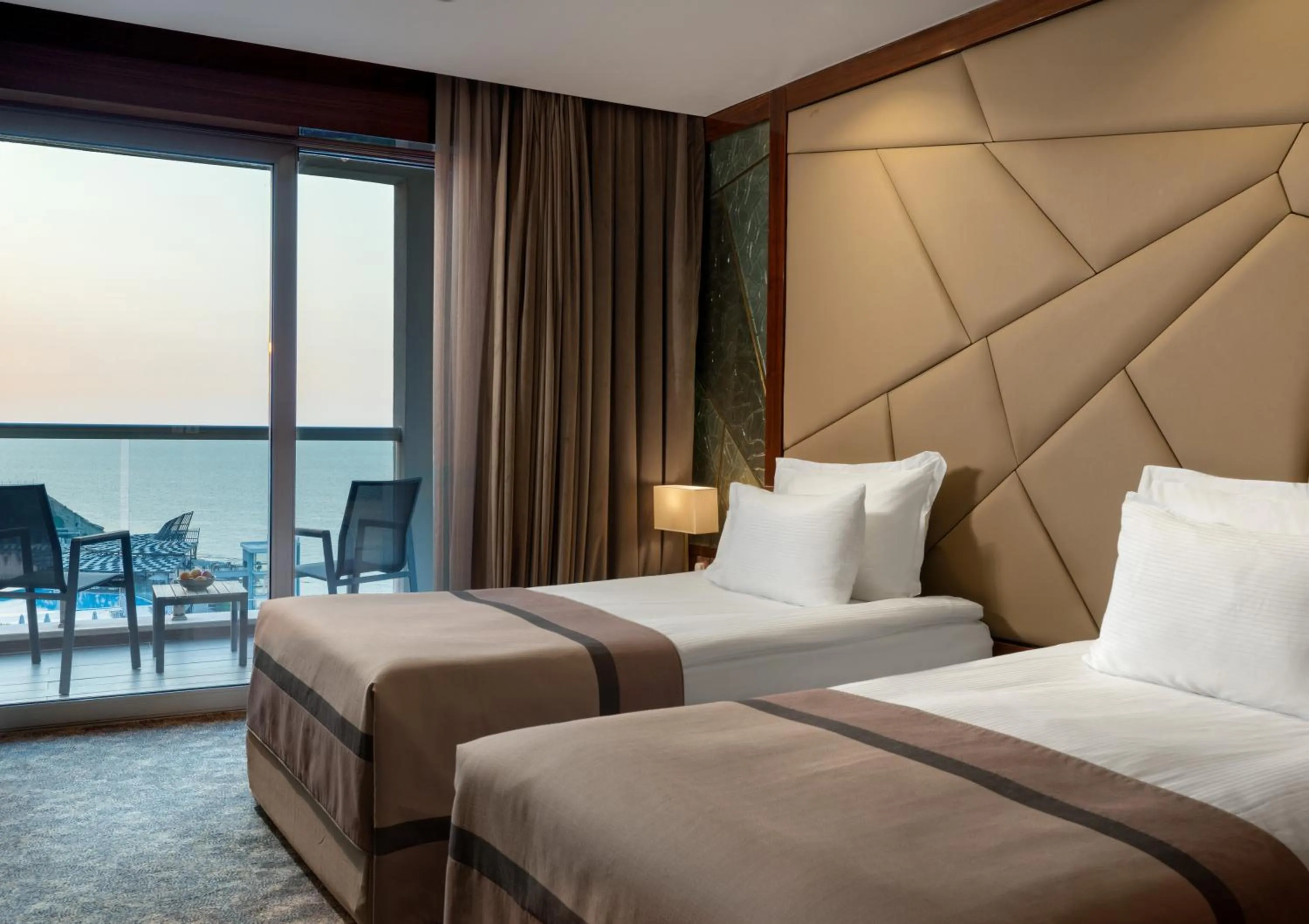 Bed in Elexus Hotel Resort & Spa & Casino