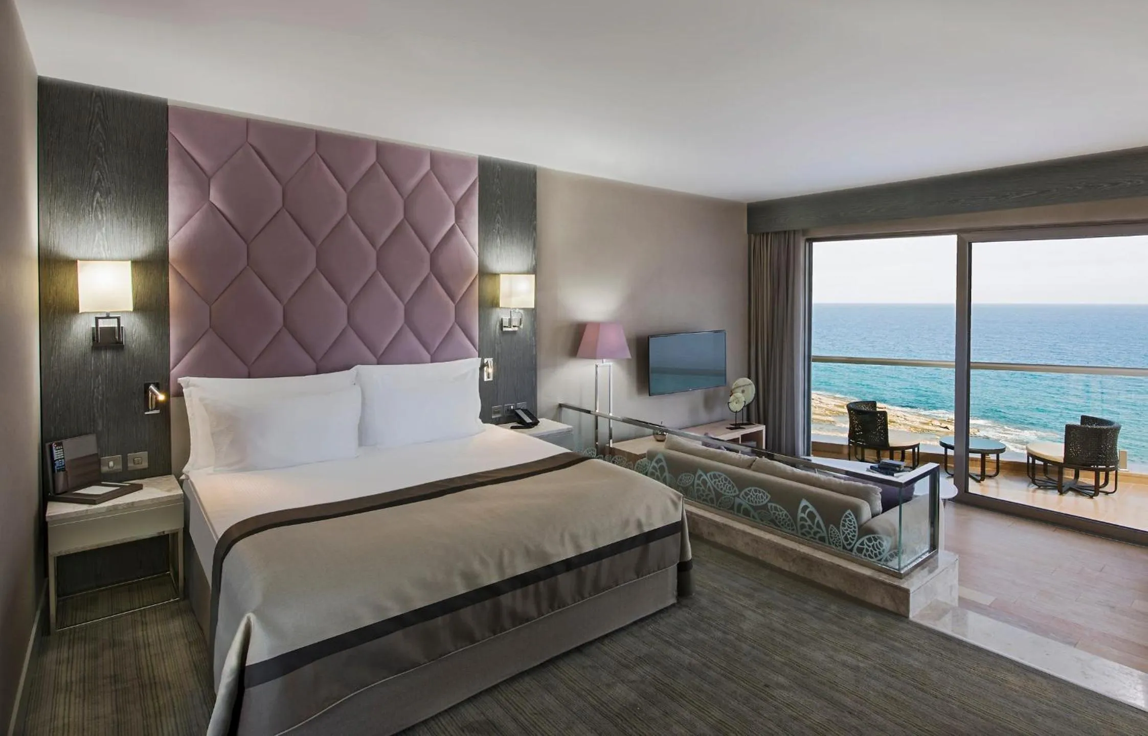 Bed in Elexus Hotel Resort & Spa & Casino