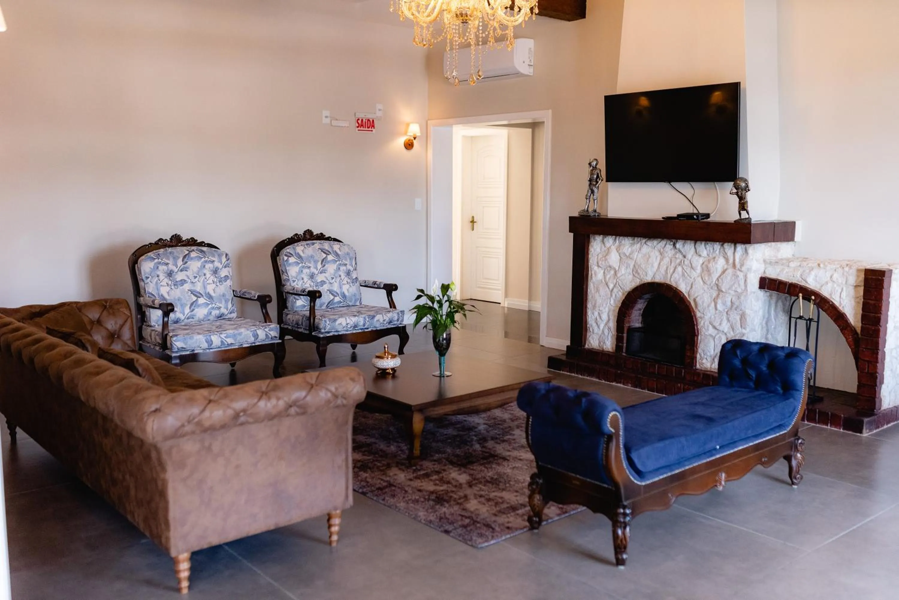 Living room in Castelo Boutique Hotel