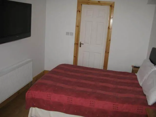 Bed in Dun Aoibhinn Guest Accommodation