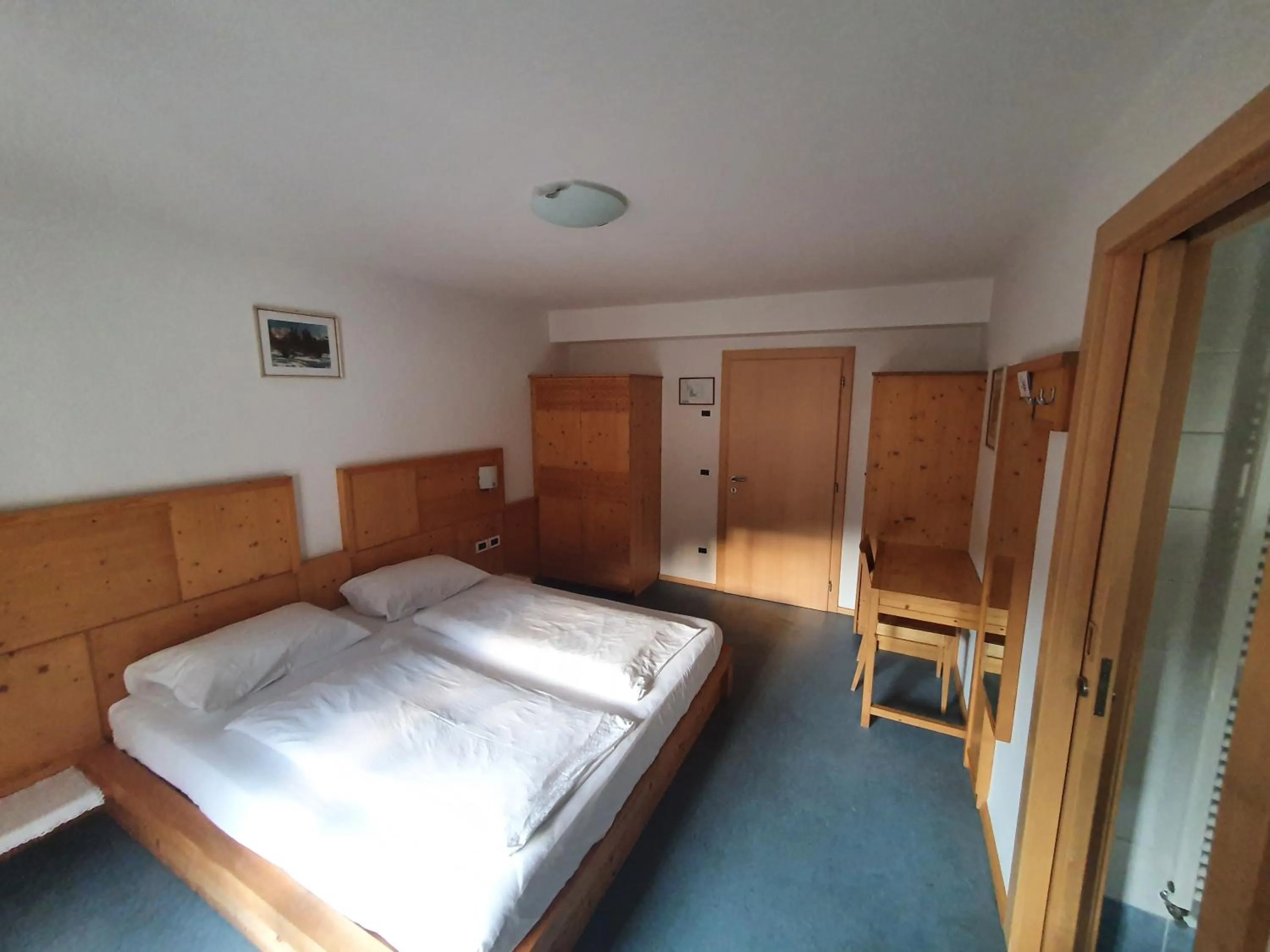 Bed in ALBERGO BAR RISTORANTE DOLOMIA