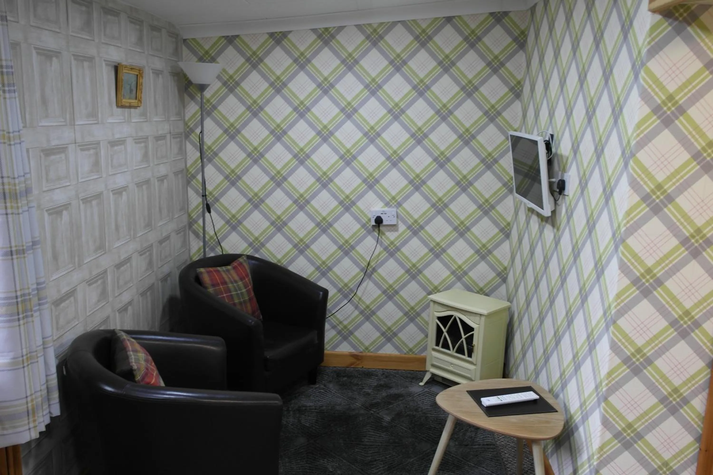 Seating area in The Steading Highland Glen Lodge