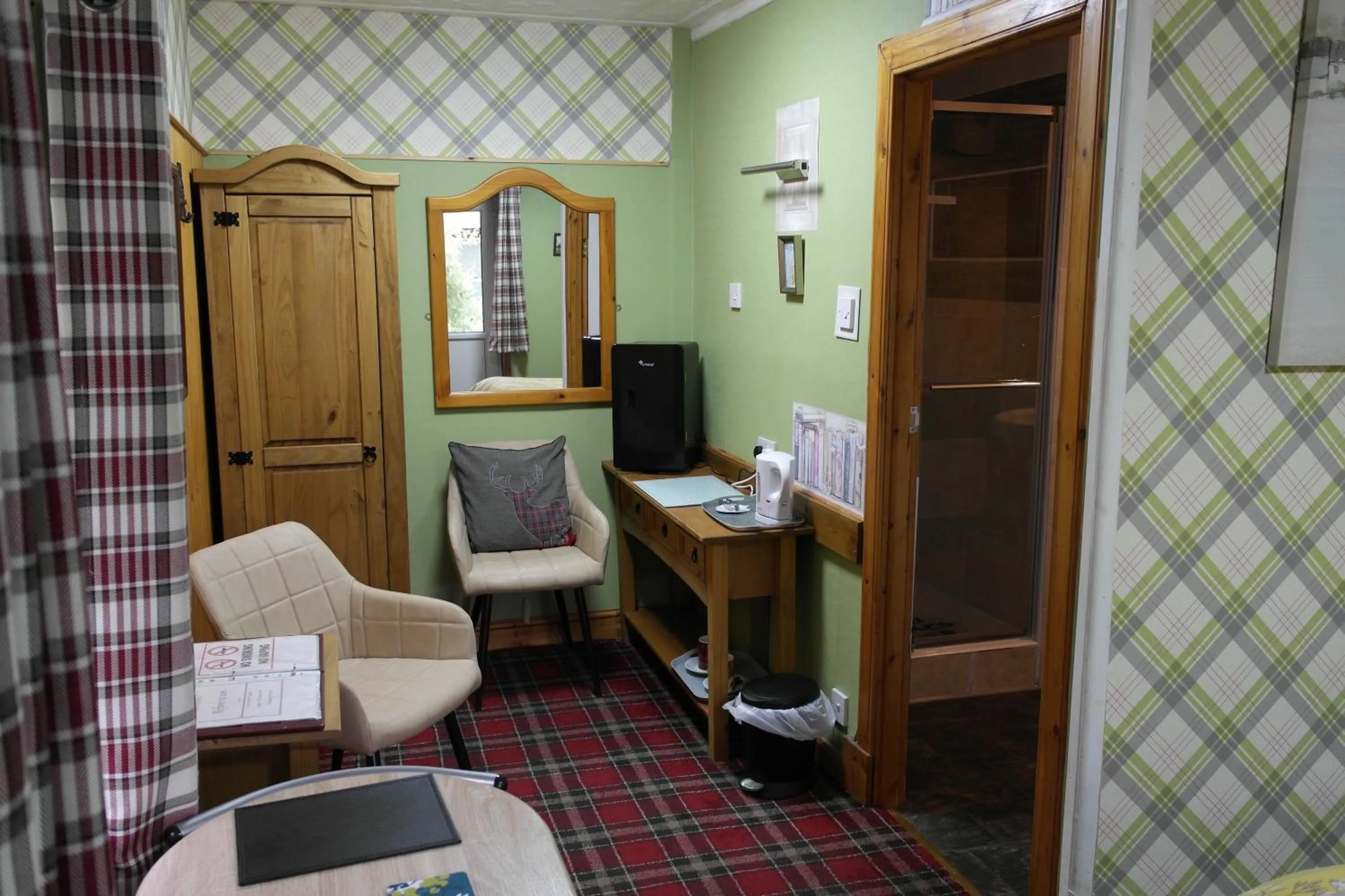 Seating area in The Steading Highland Glen Lodge