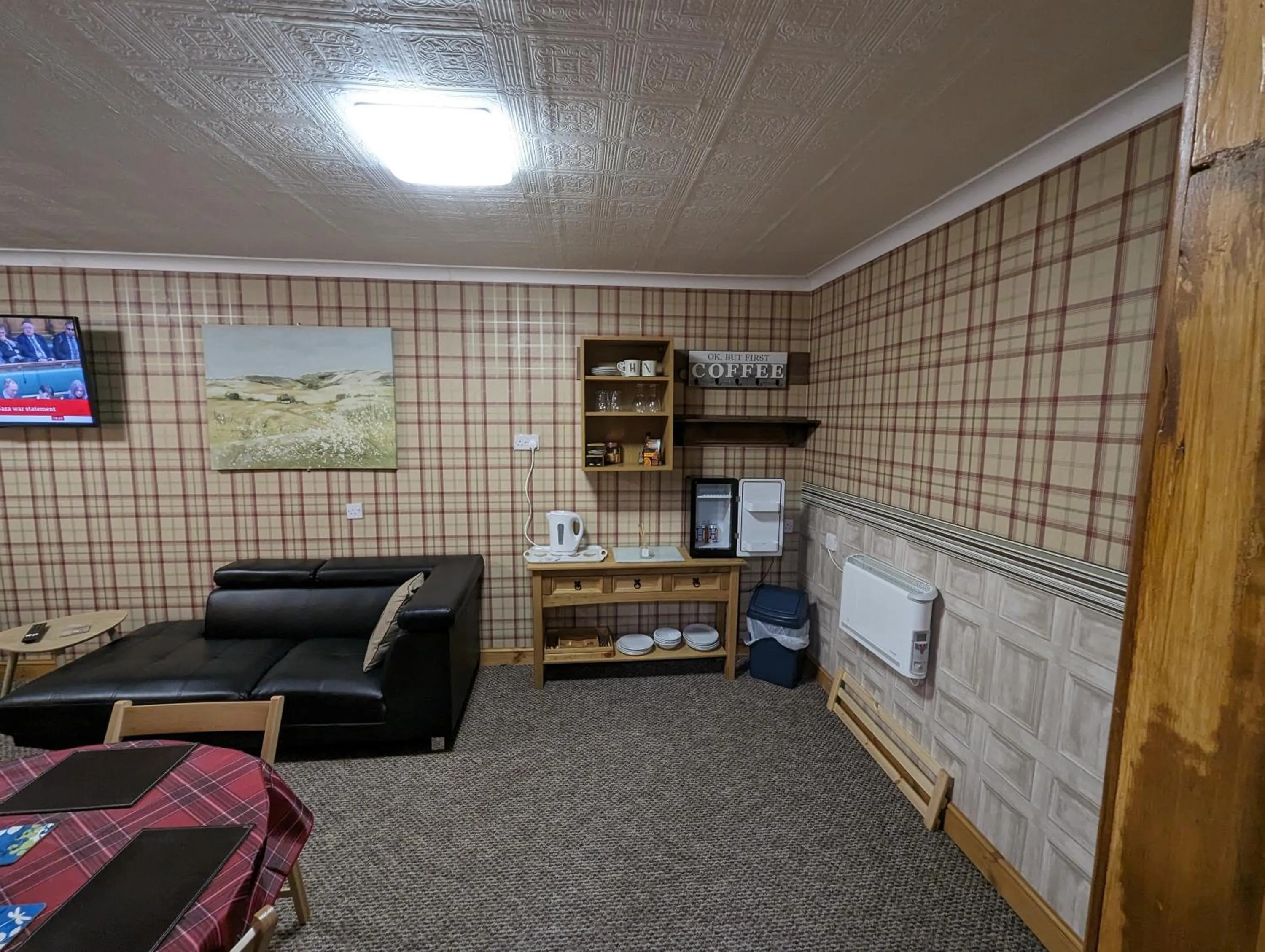 Seating area in The Steading Highland Glen Lodge