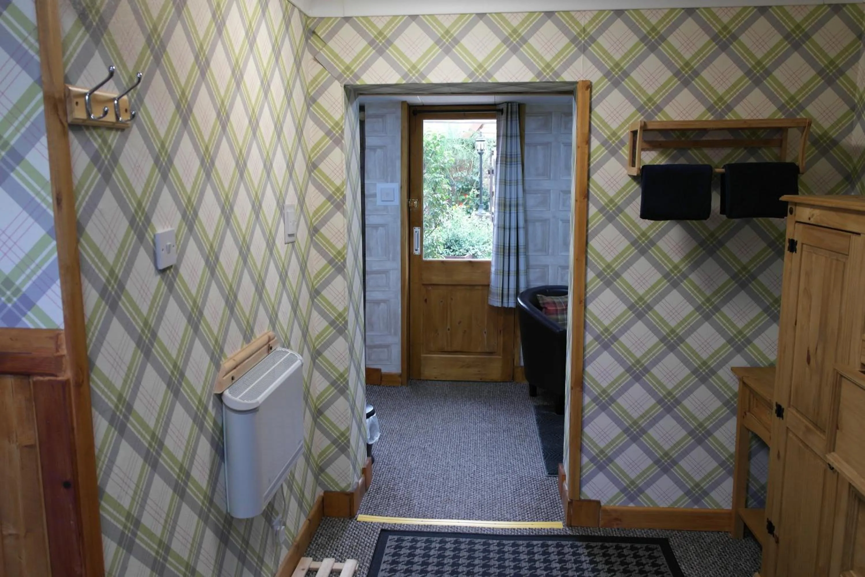 Seating area in The Steading Highland Glen Lodge