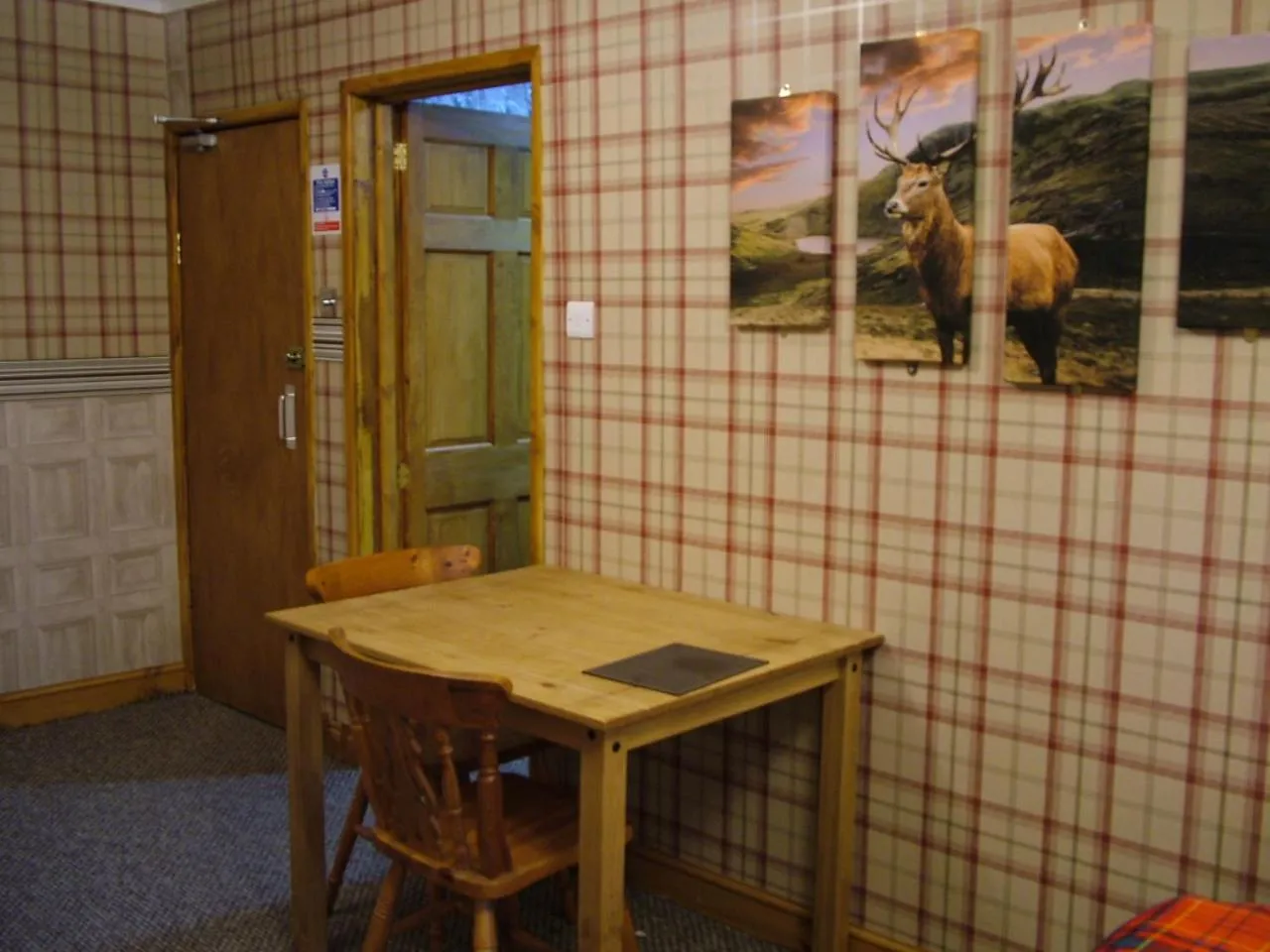 Dining area in The Steading Highland Glen Lodge
