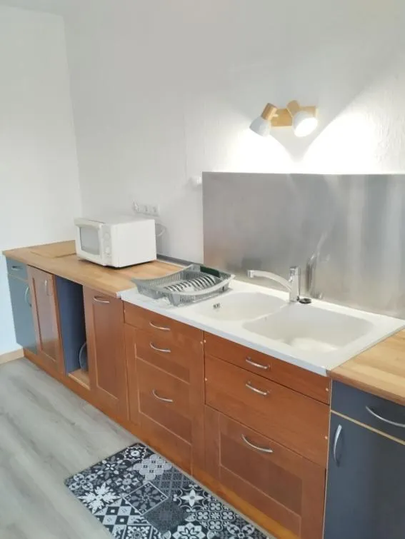 Kitchen or kitchenette in Au Bonheur de Cisse