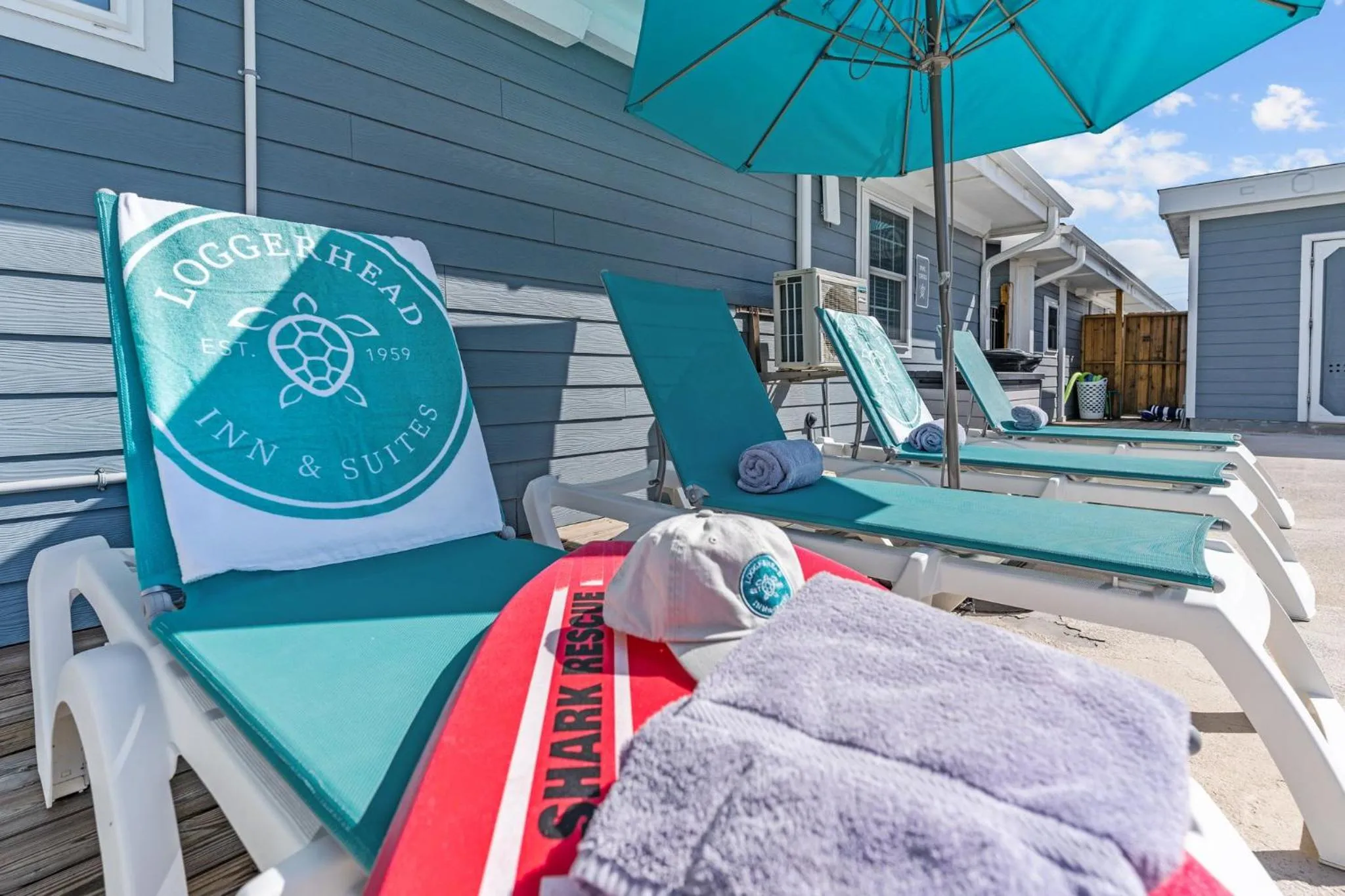 Swimming pool in Loggerhead Inn and Suites
