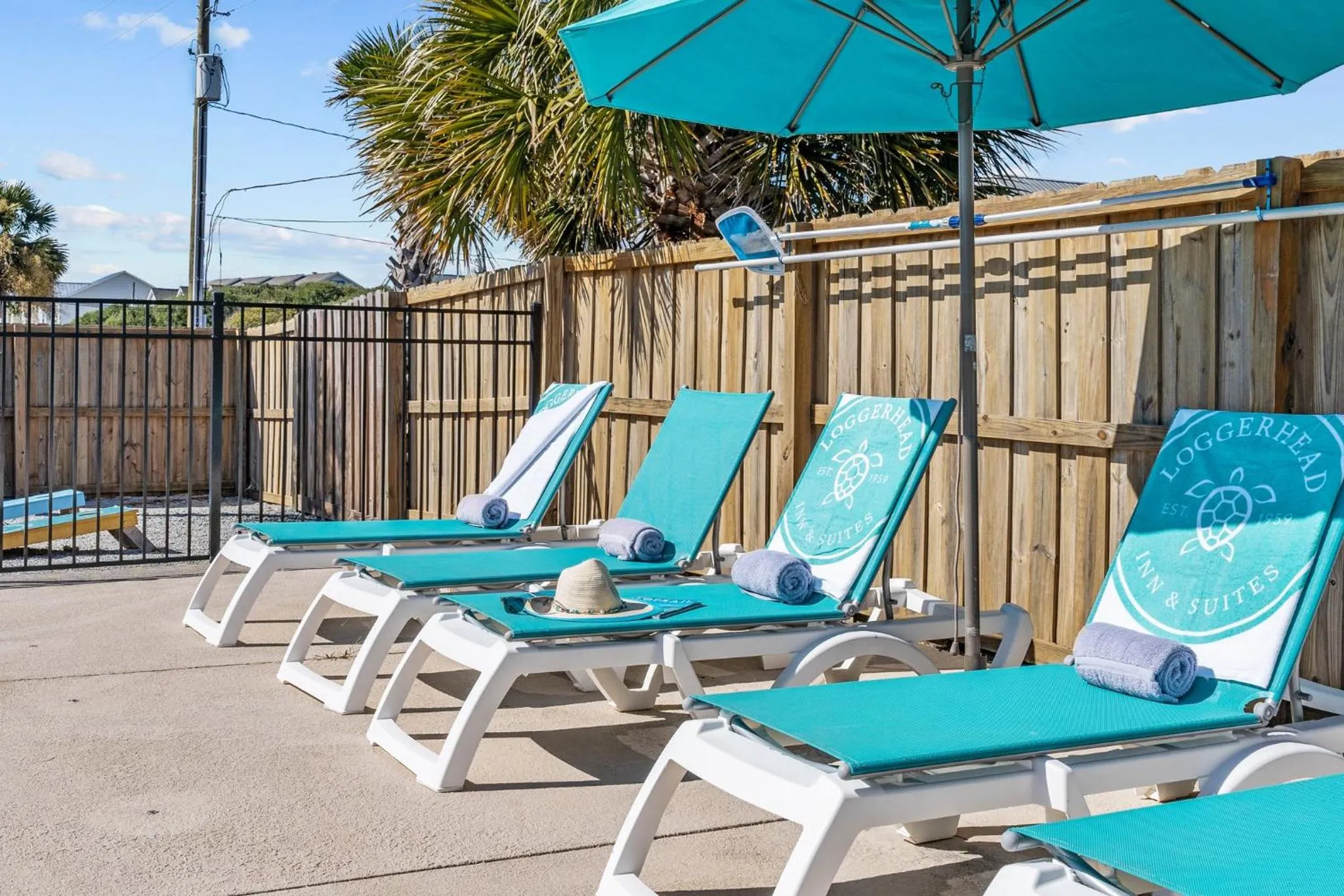 Swimming pool in Loggerhead Inn and Suites