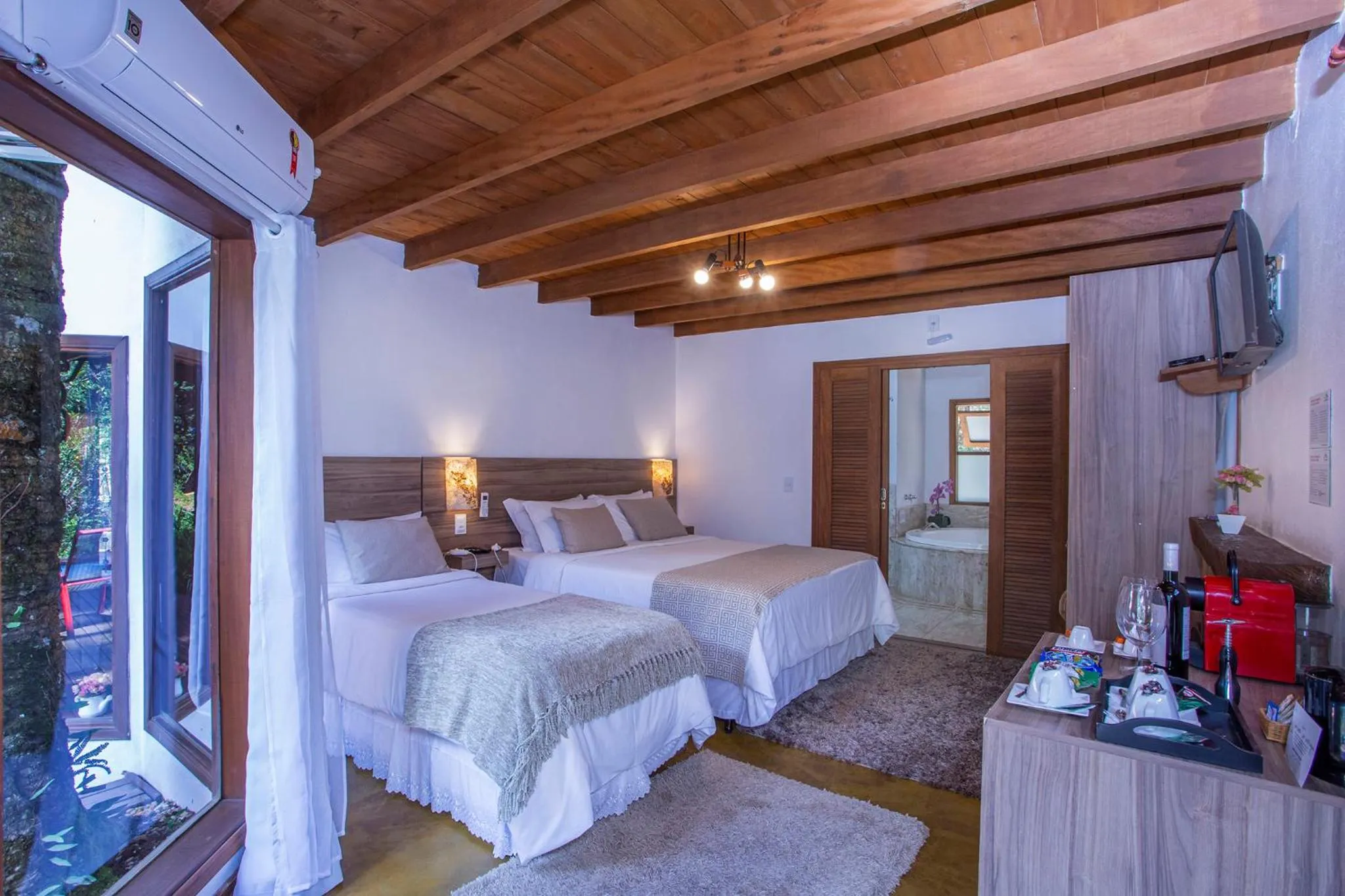 Bed in Pousada Suiça Mineira Garden