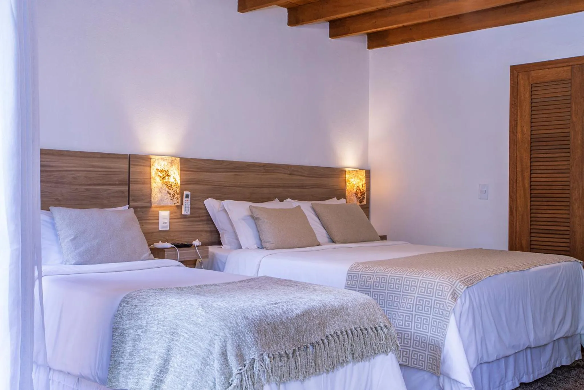 Bed in Pousada Suiça Mineira Garden