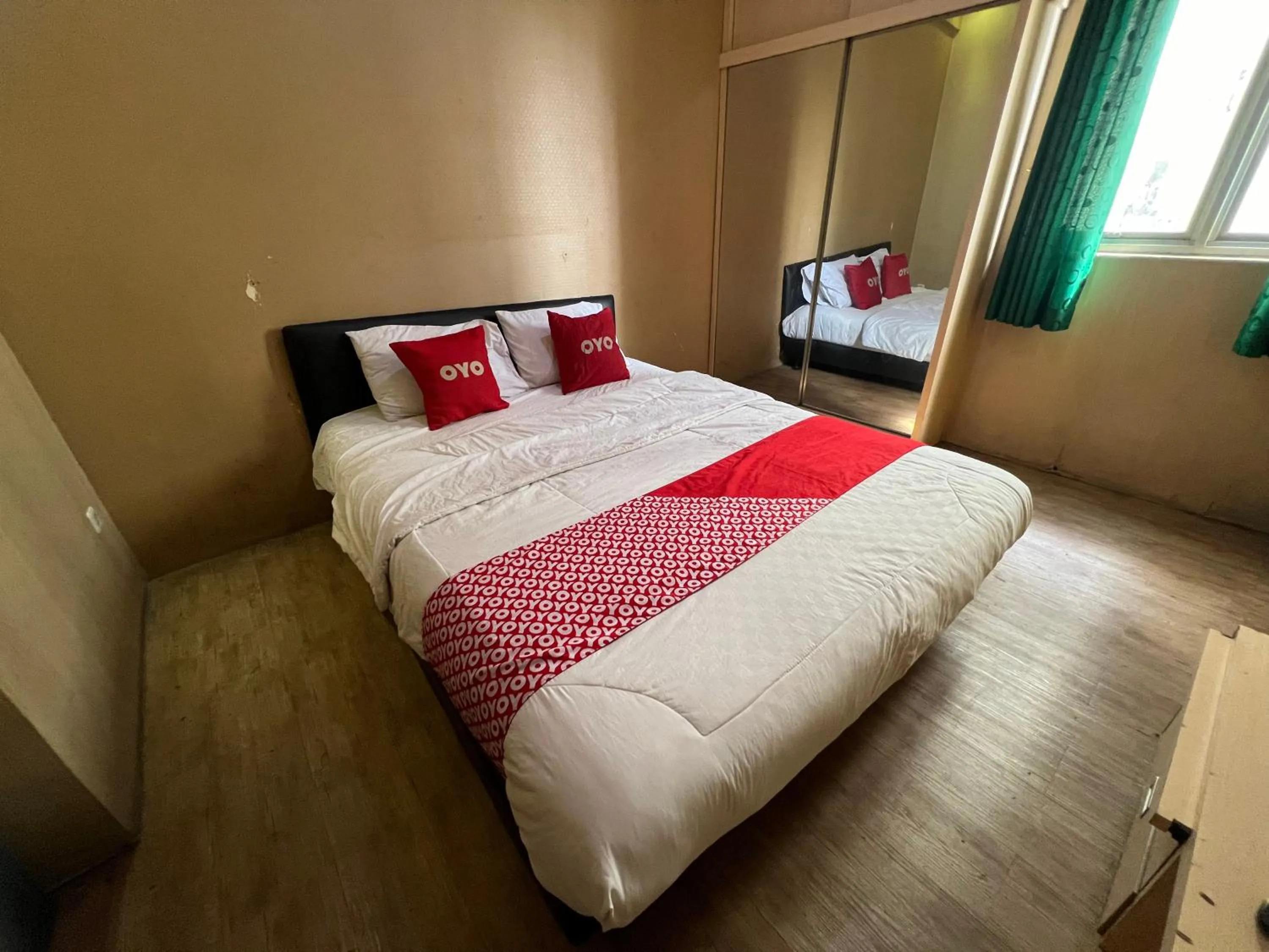 Bedroom in OYO 93828 Apartemen Tamansari Panoramic By Narel Room