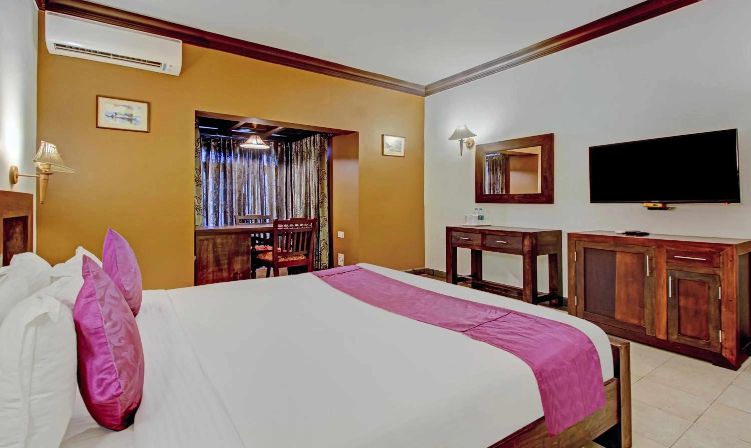 Bedroom, Bed in Treebo Premium Travancore Palace Cherthala