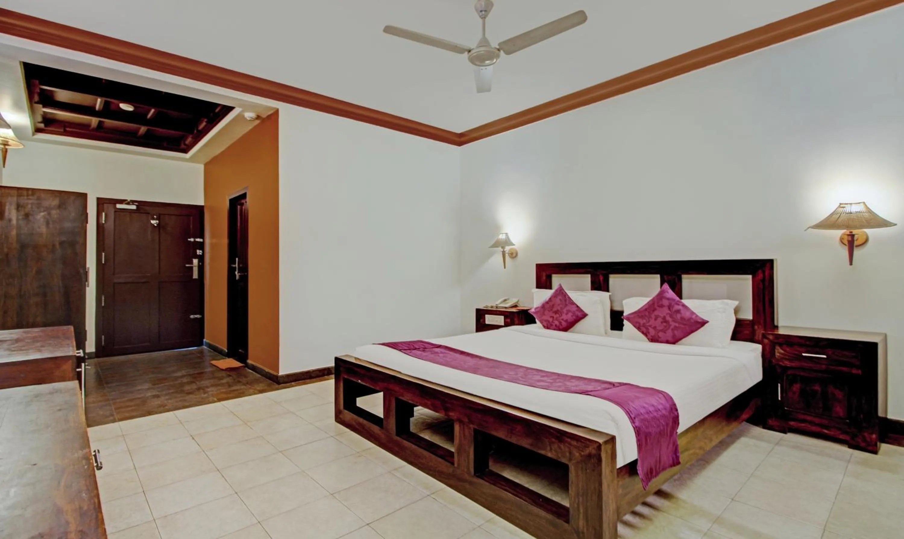 Bedroom, Bed in Treebo Premium Travancore Palace Cherthala