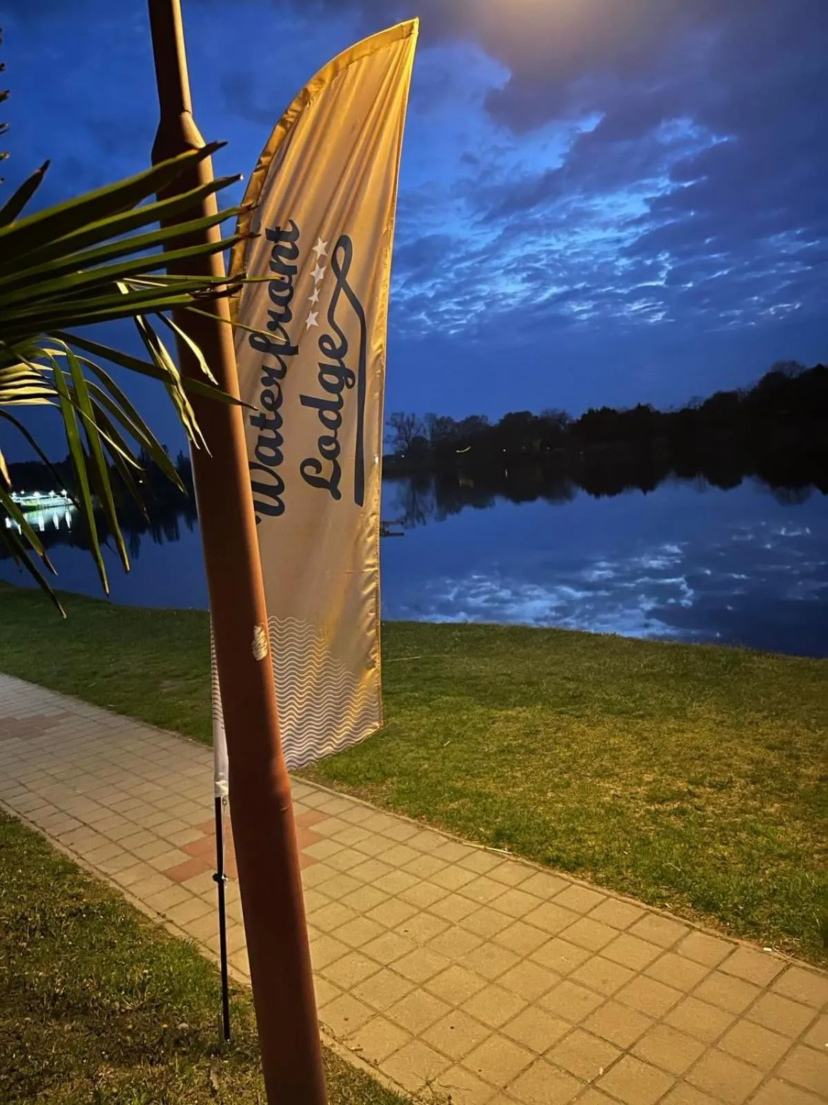Property logo or sign in Waterfront Lodge