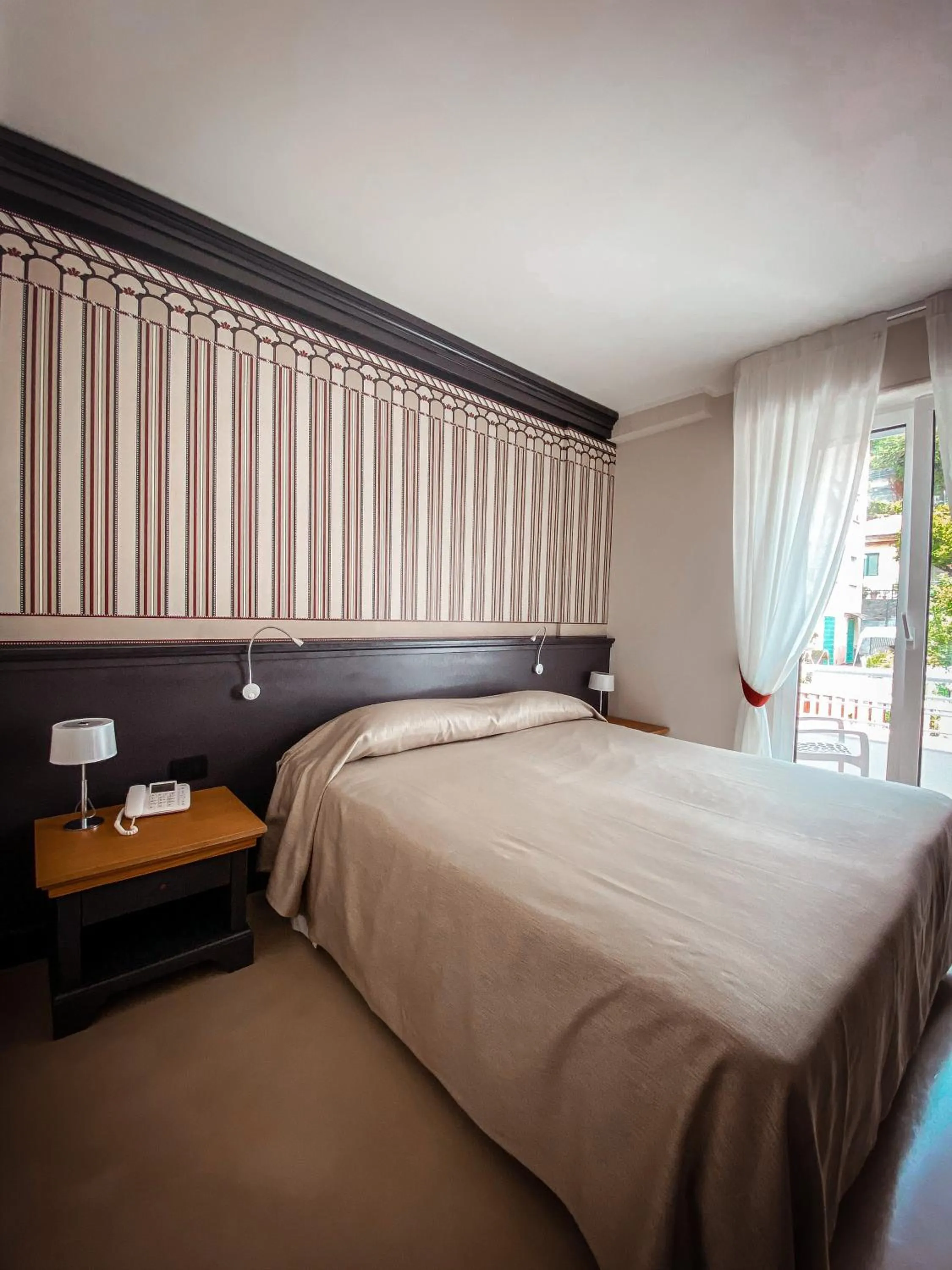 Bed in MH HOTEL VARAZZE