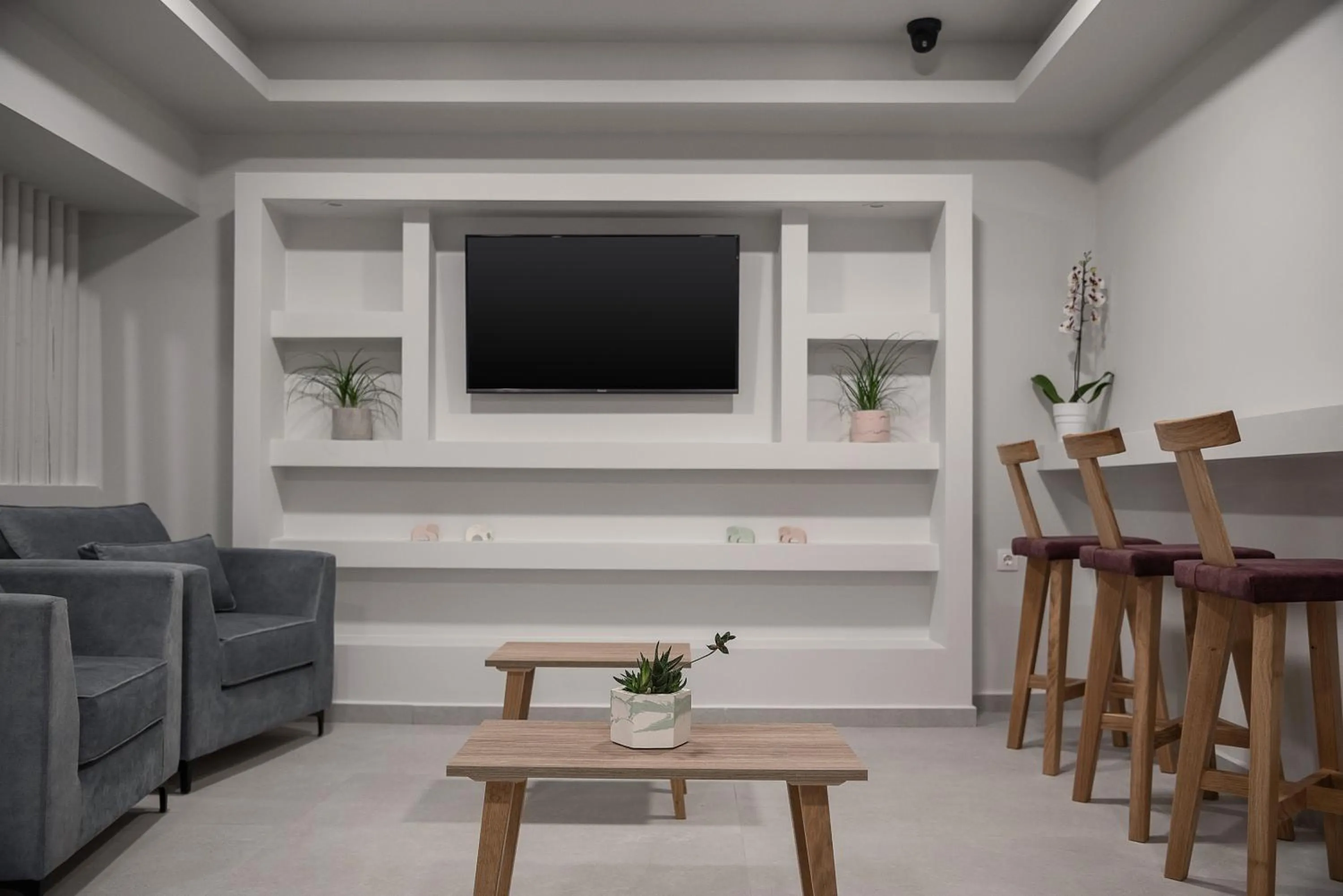 Communal lounge/ TV room in Morum City Hotel Chania