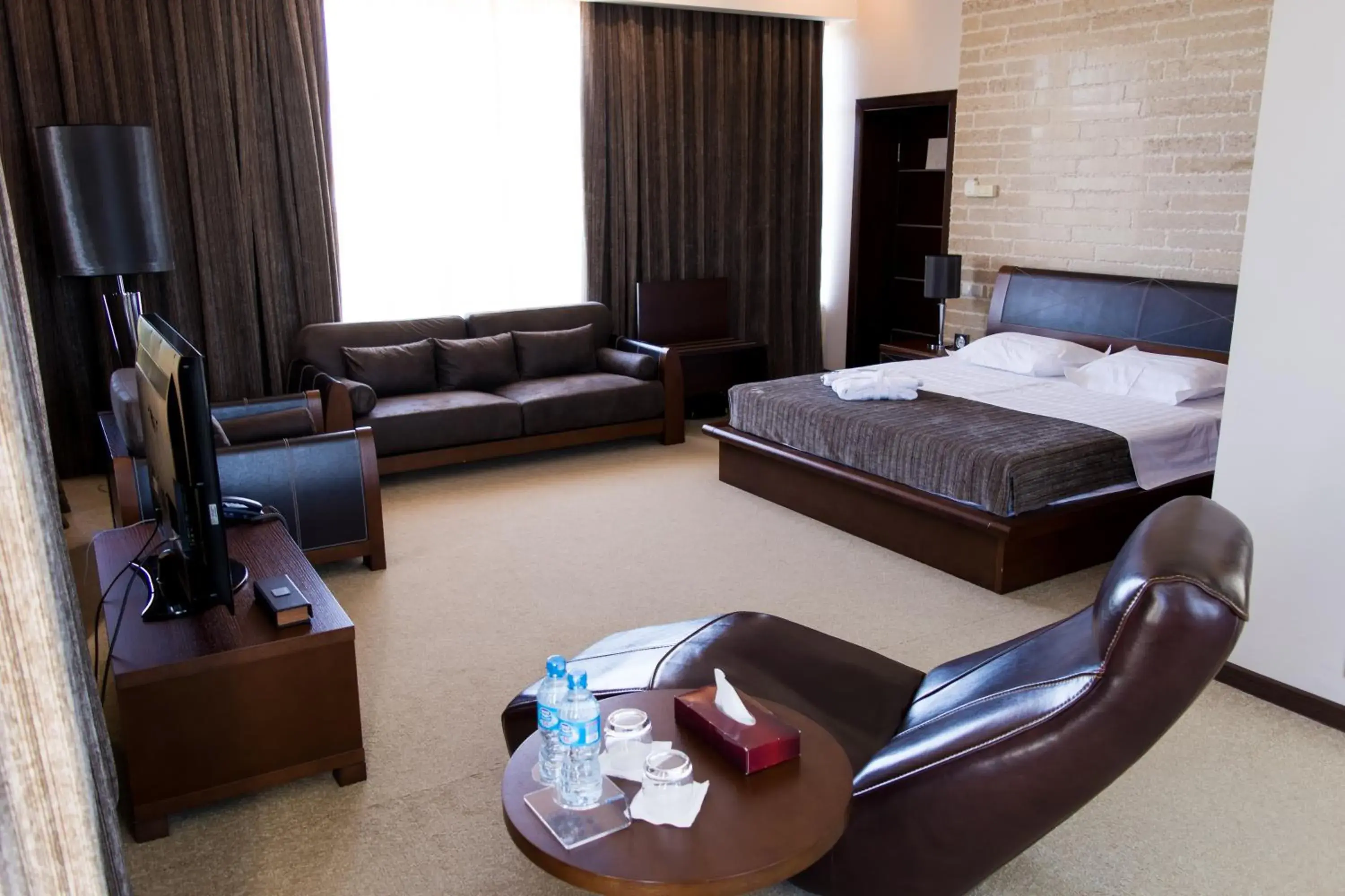 Photo of the whole room, Bed in Grand M Hotel Photo of the whole room, Bed in Grand M Hotel