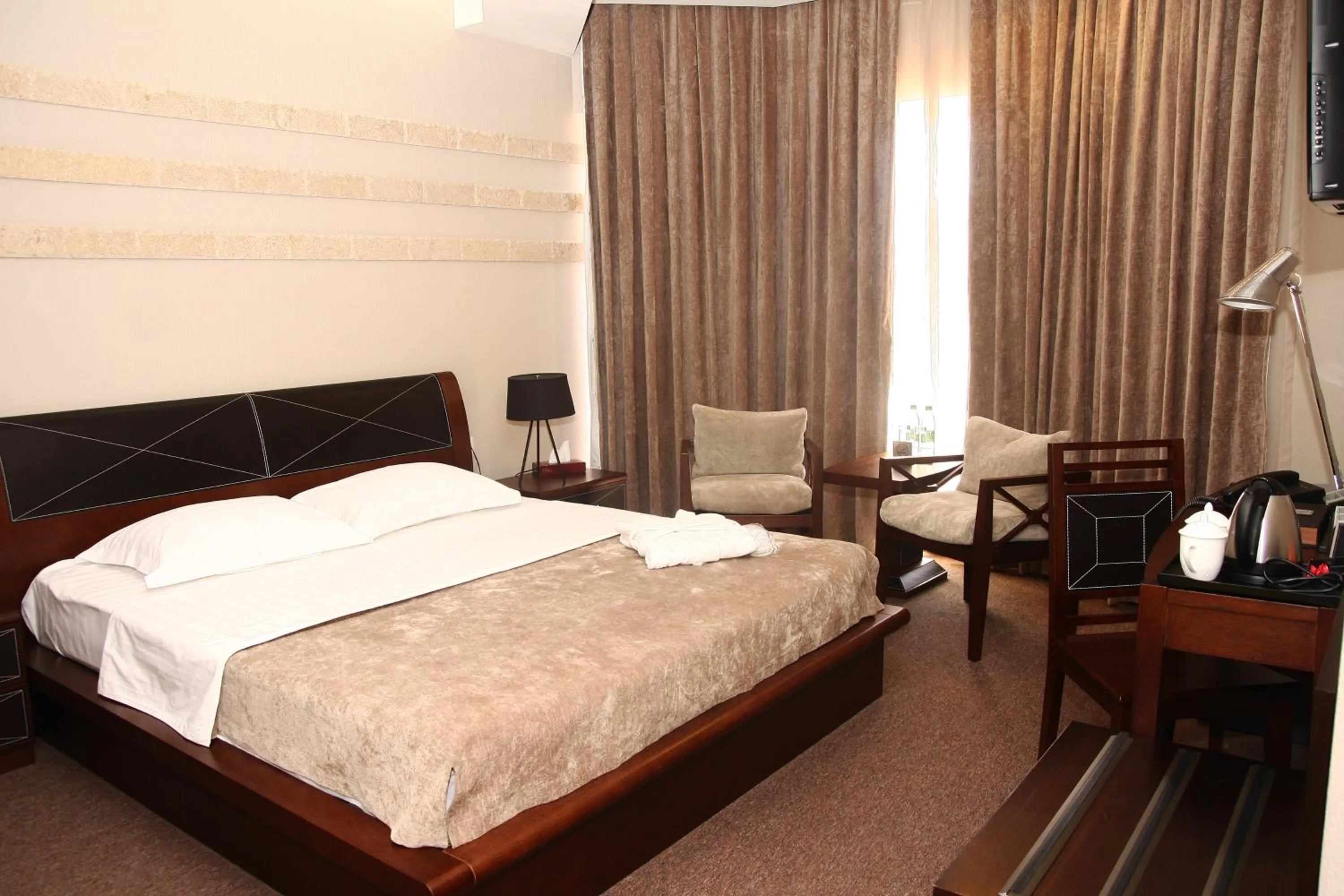 Photo of the whole room in Grand M Hotel