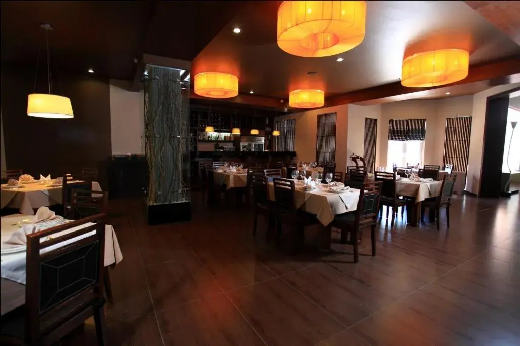 Lounge or bar in Grand M Hotel Lounge or bar in Grand M Hotel