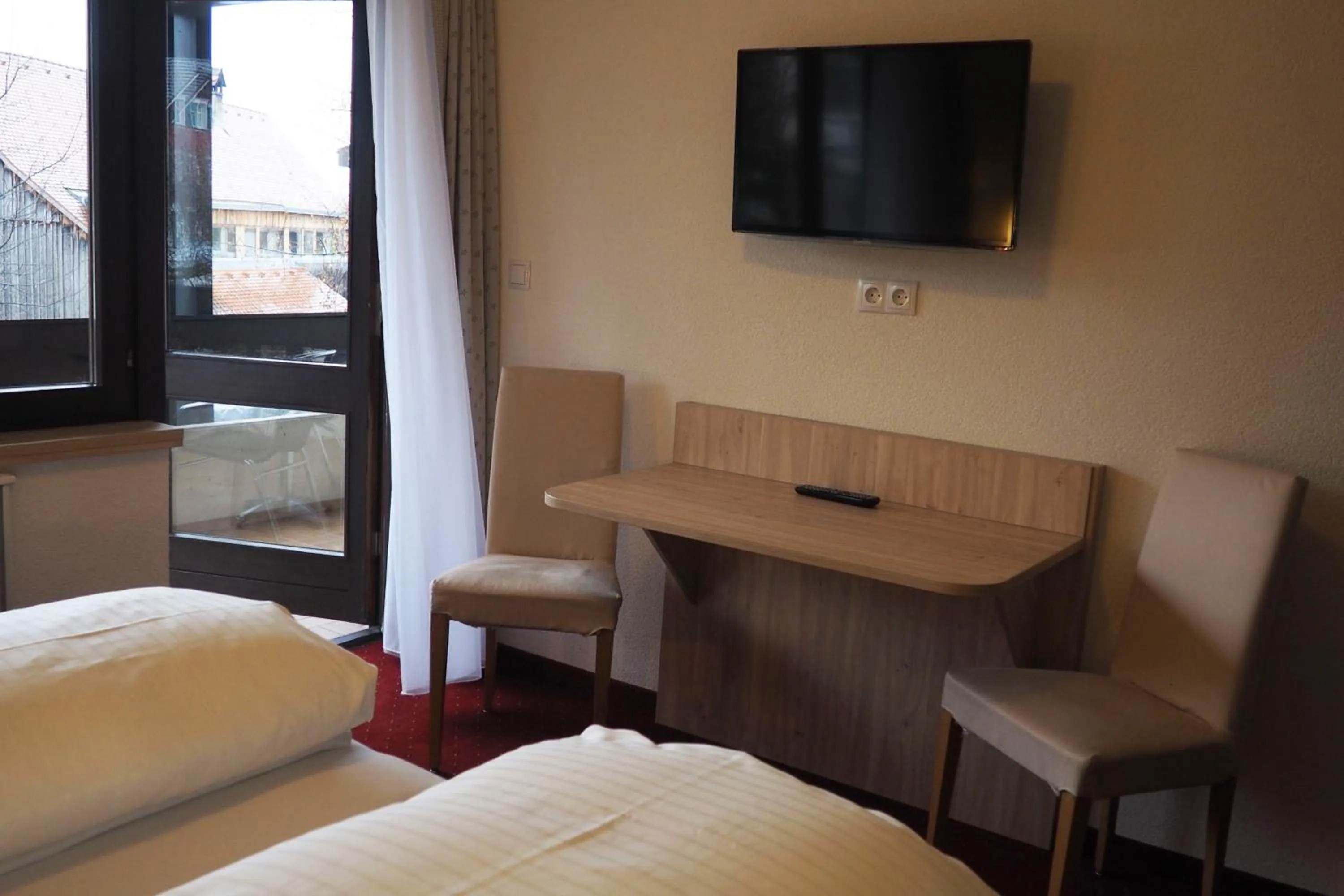 Photo of the whole room, Bed in Hotel Restaurant Rössle