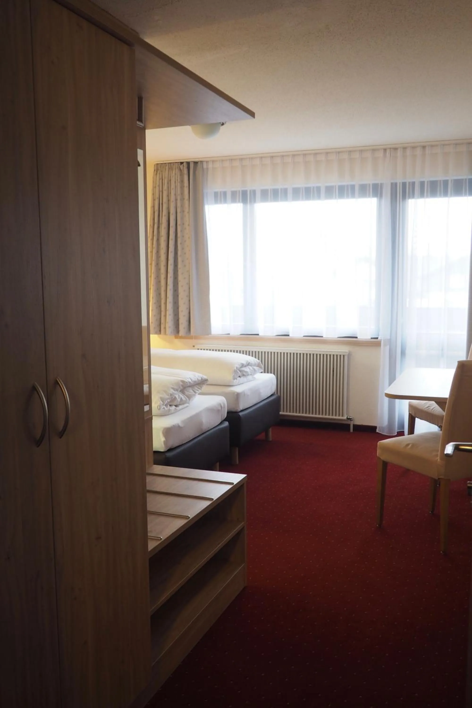 Photo of the whole room, Bed in Hotel Restaurant Rössle