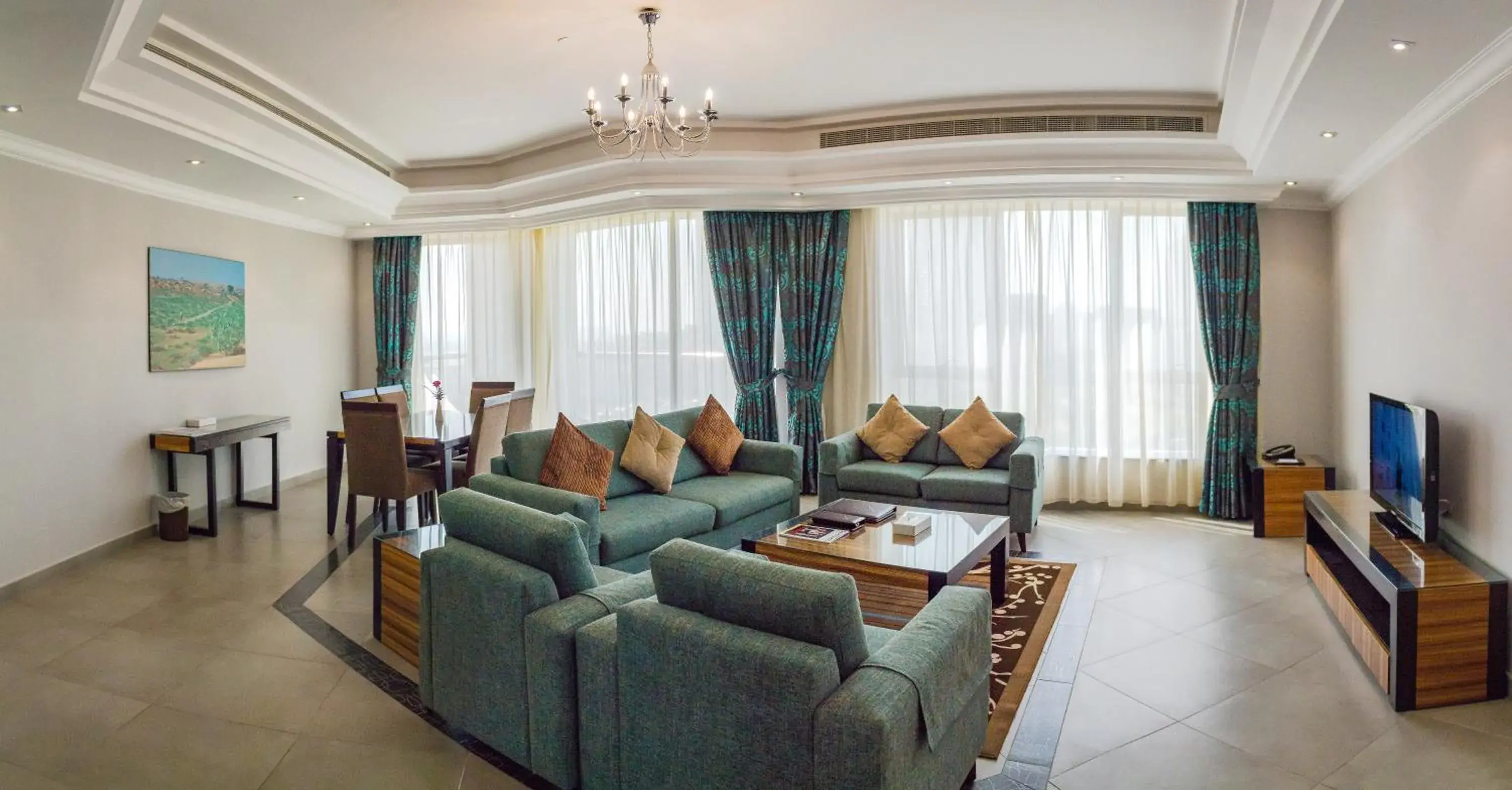 Living room in Al Majaz Premiere Hotel Apartments Living room in Al Majaz Premiere Hotel Apartments