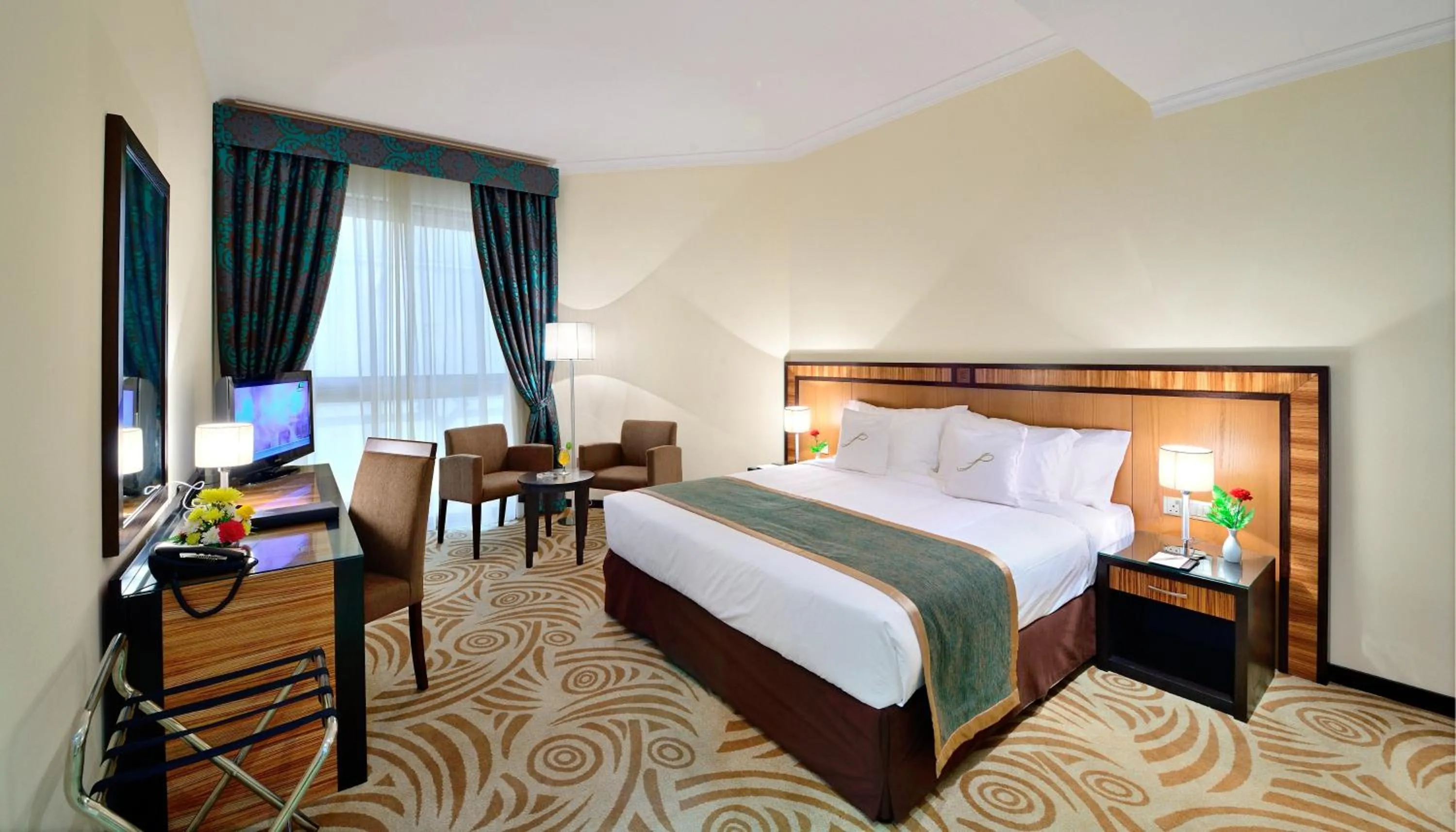 Bed in Al Majaz Premiere Hotel Apartments