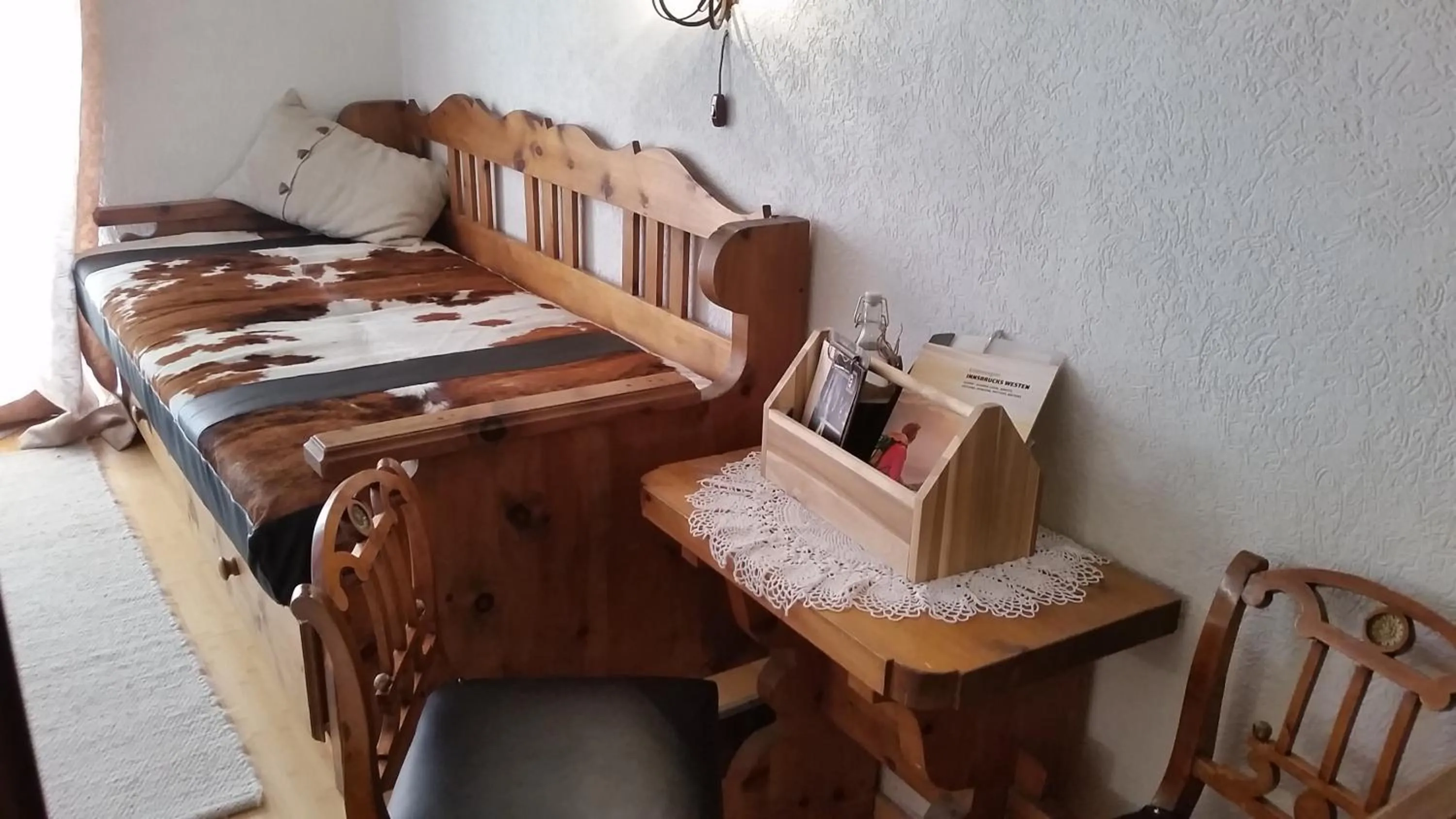 Seating area, Bed in Alp Art Hotel Götzens