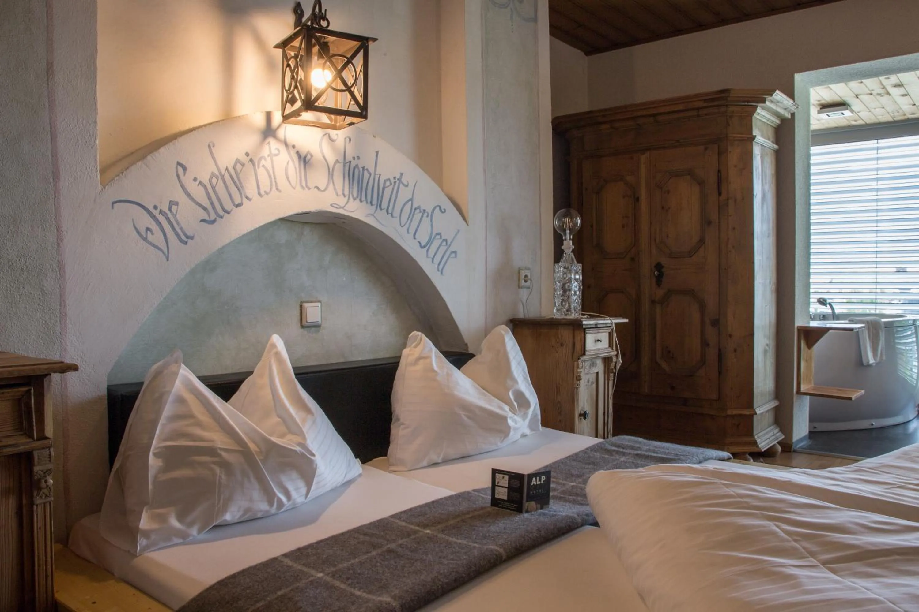 Photo of the whole room, Bed in Alp Art Hotel Götzens