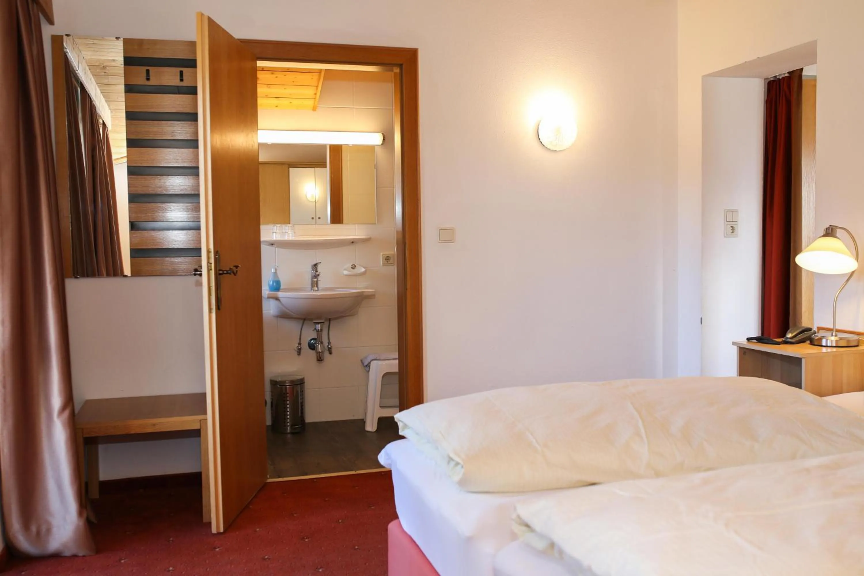 Bed in Hotel Sonnenhof - bed & breakfast & appartements