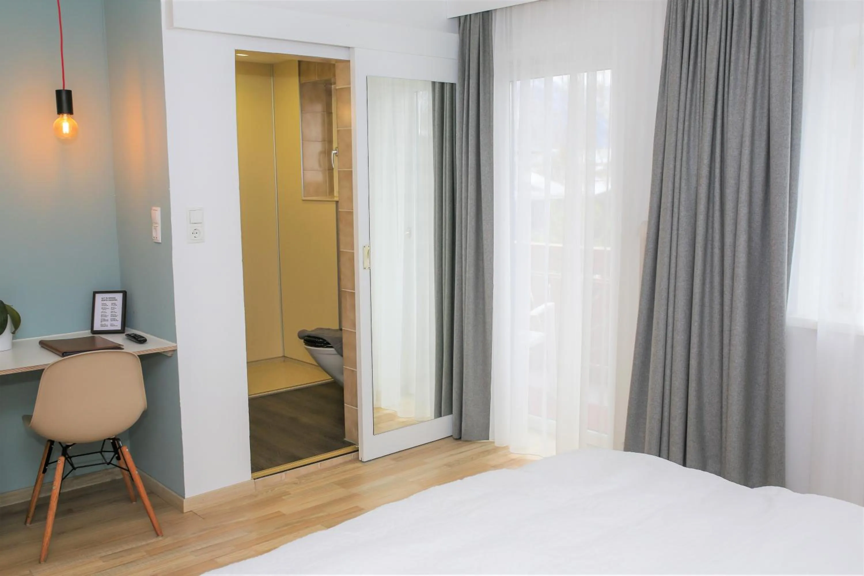 Living room, Bed in Hotel Sonnenhof - bed & breakfast & appartements