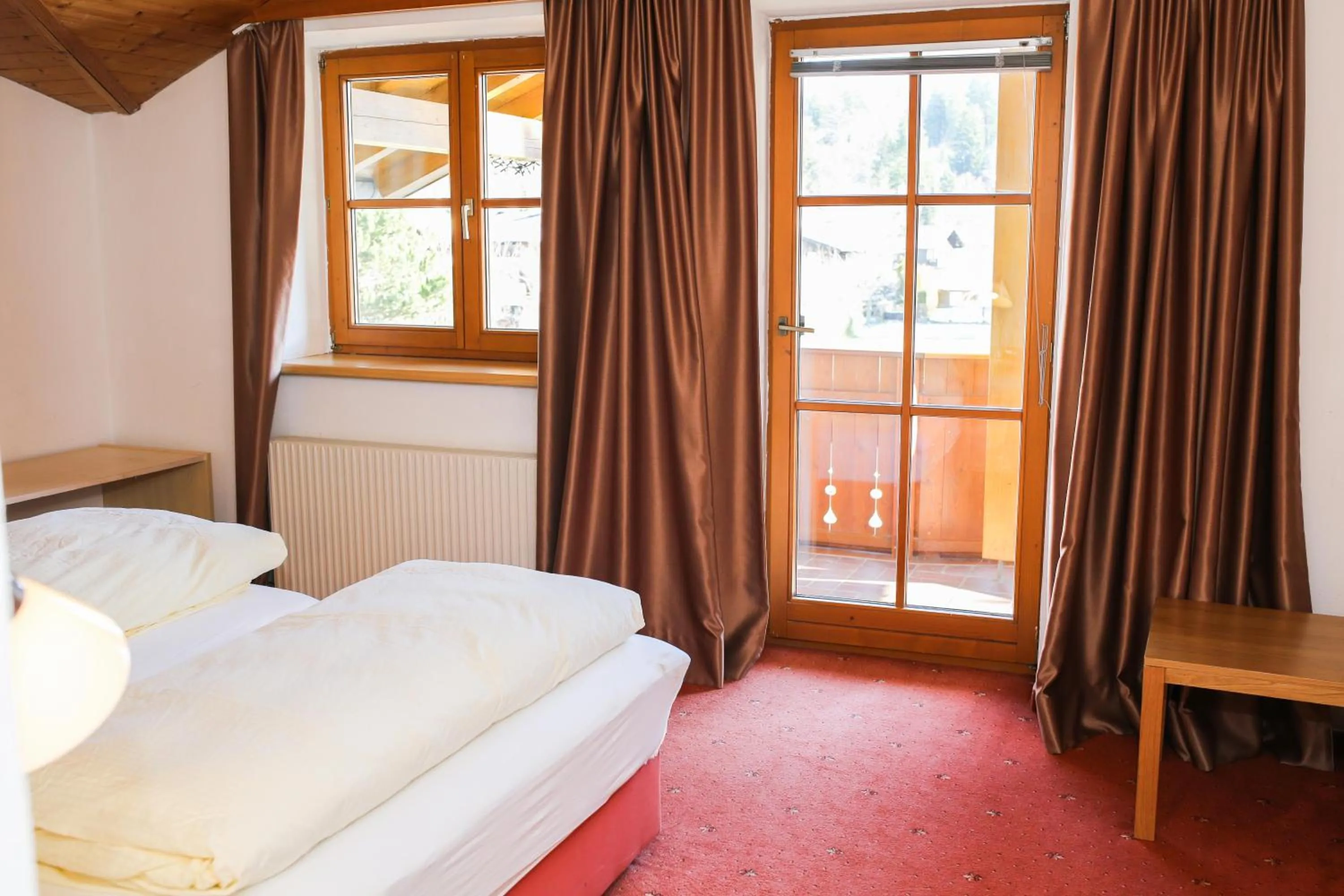 Bedroom, Bed in Hotel Sonnenhof - bed & breakfast & appartements