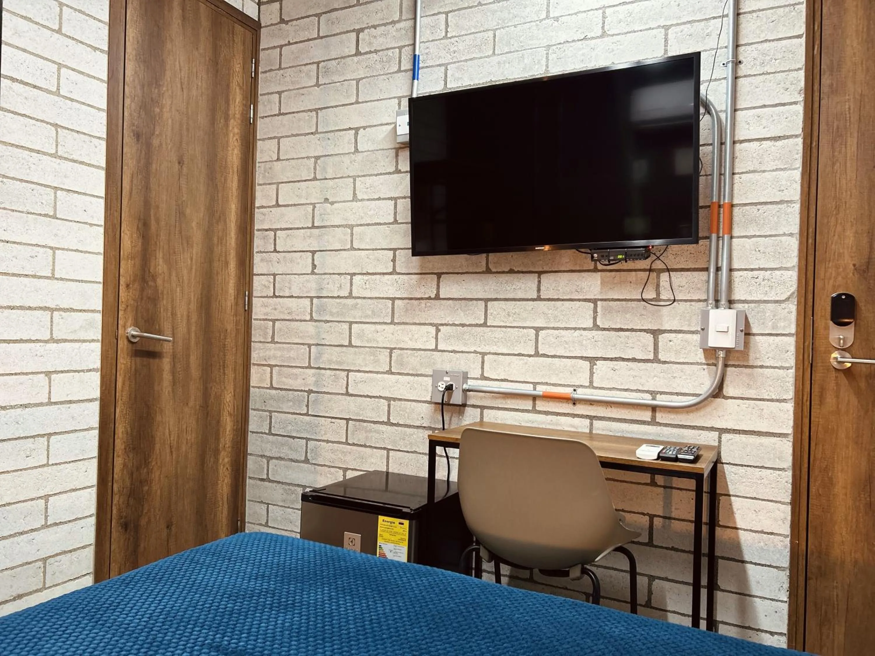 Seating area, Bed in Manila Hotel Boutique