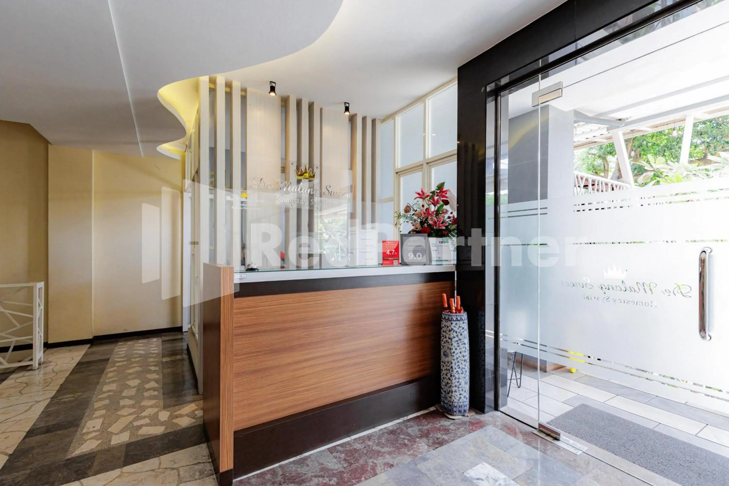 Lobby or reception in De Malang Sweet Homestay Syariah Mitra RedDoorz