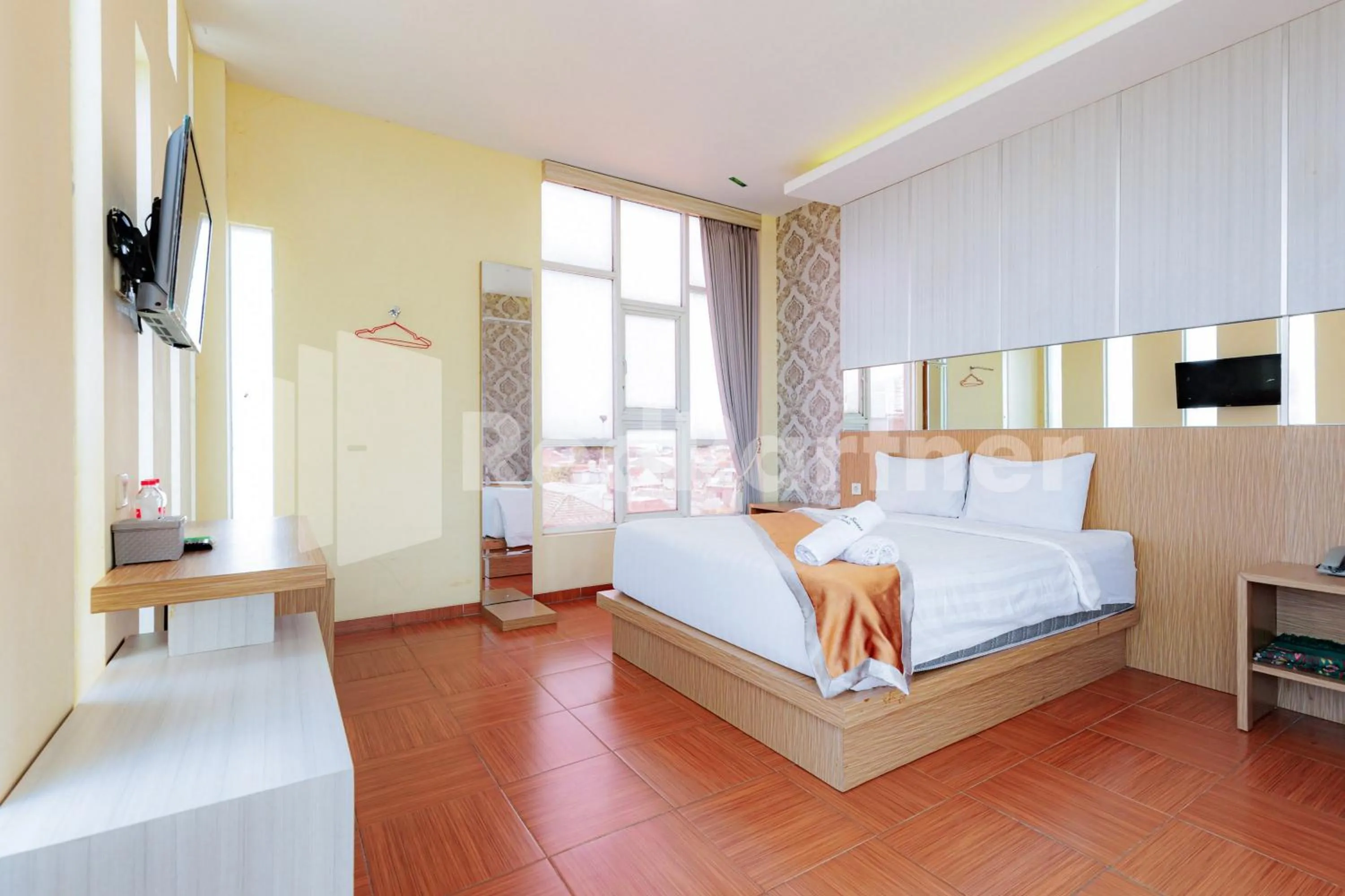 Deluxe Double Room in De Malang Sweet Homestay Syariah Mitra RedDoorz