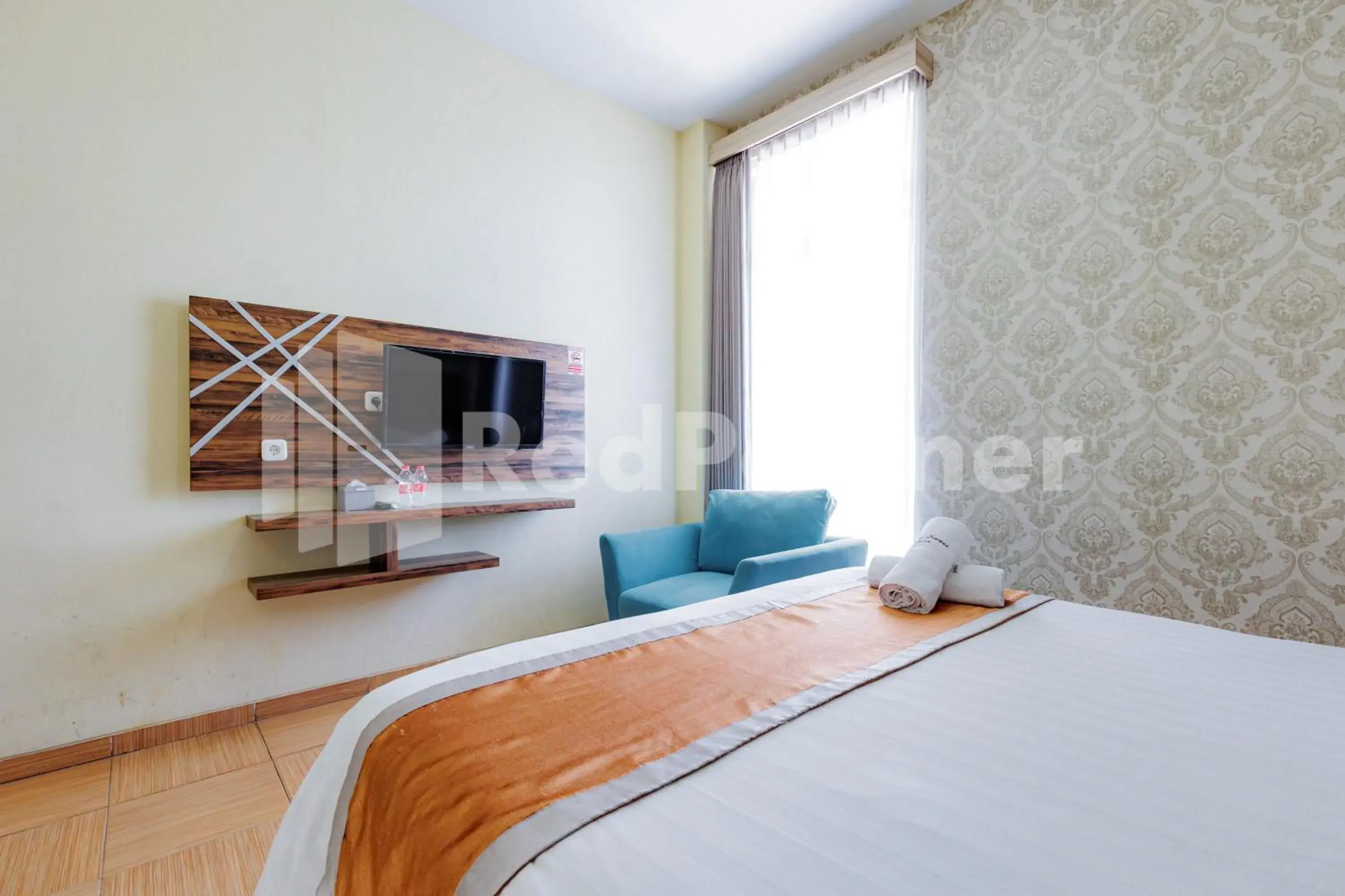 Superior Double Room in De Malang Sweet Homestay Syariah Mitra RedDoorz Superior Double Room in De Malang Sweet Homestay Syariah Mitra RedDoorz